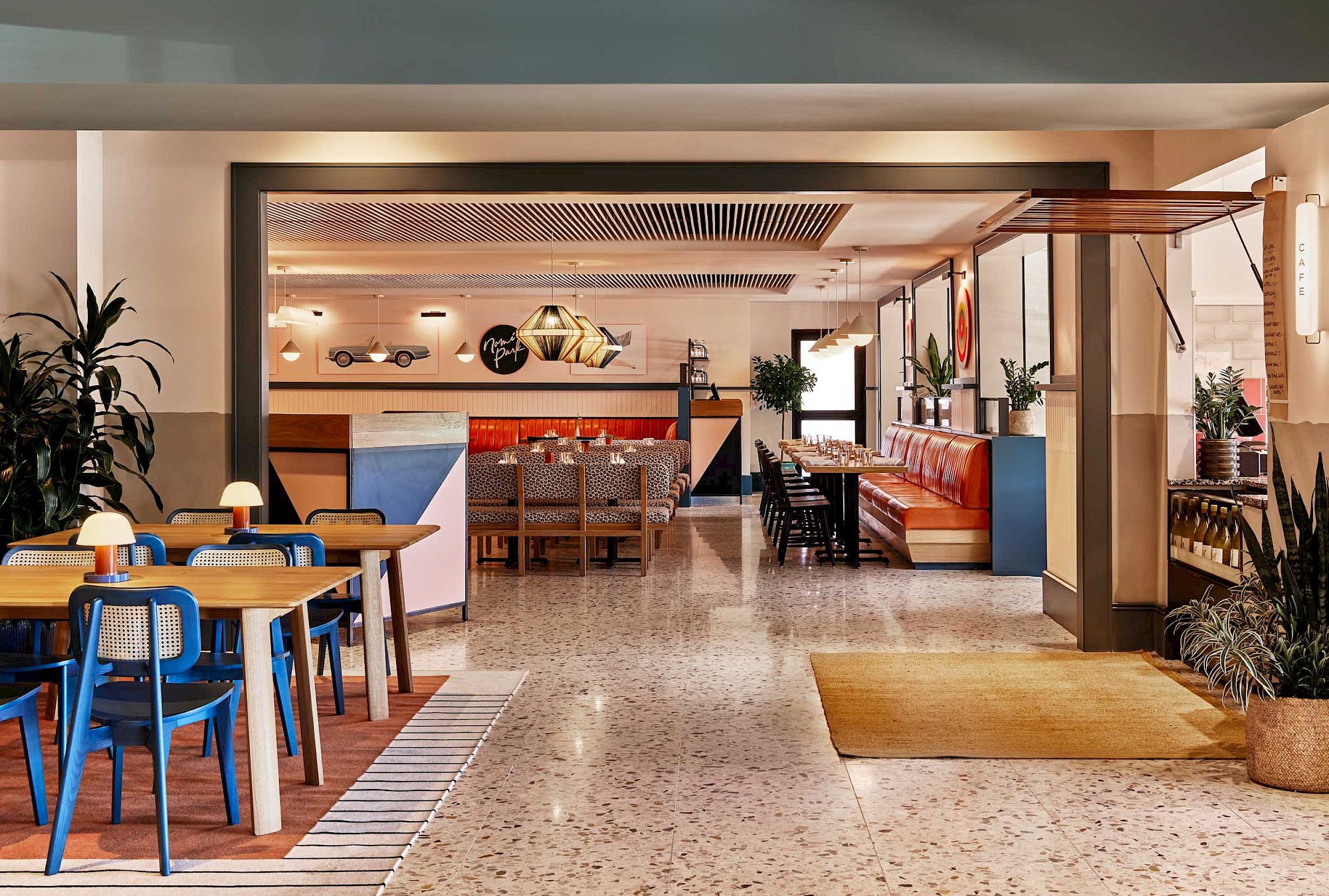 image Experience our stylish dining space, featuring modern art and cozy seating for memorable meals.