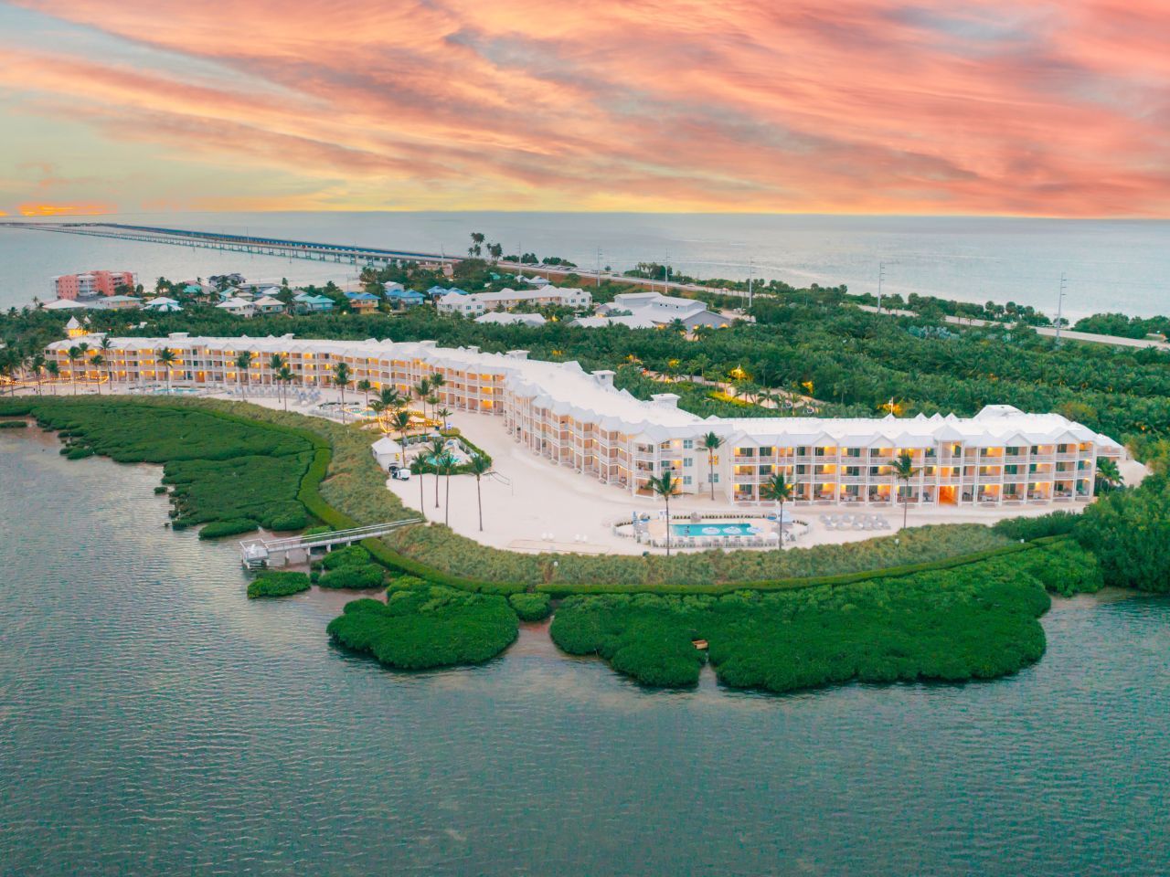 image Aerial views of this lush coastal escape highlight the perfect blend of luxury and natural beauty.