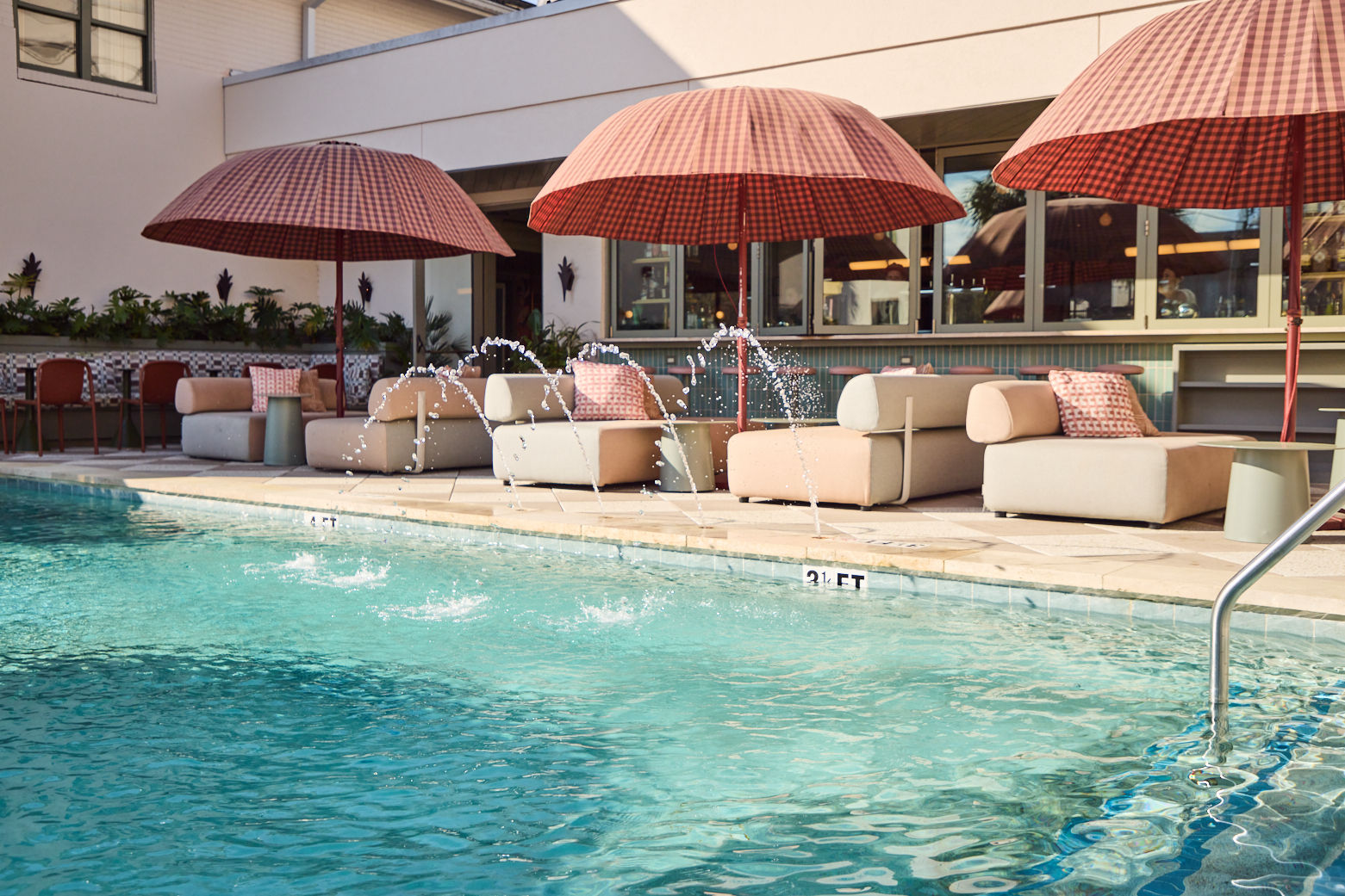 image Sun-drenched poolside moments, where laid-back luxury meets effortless charm.