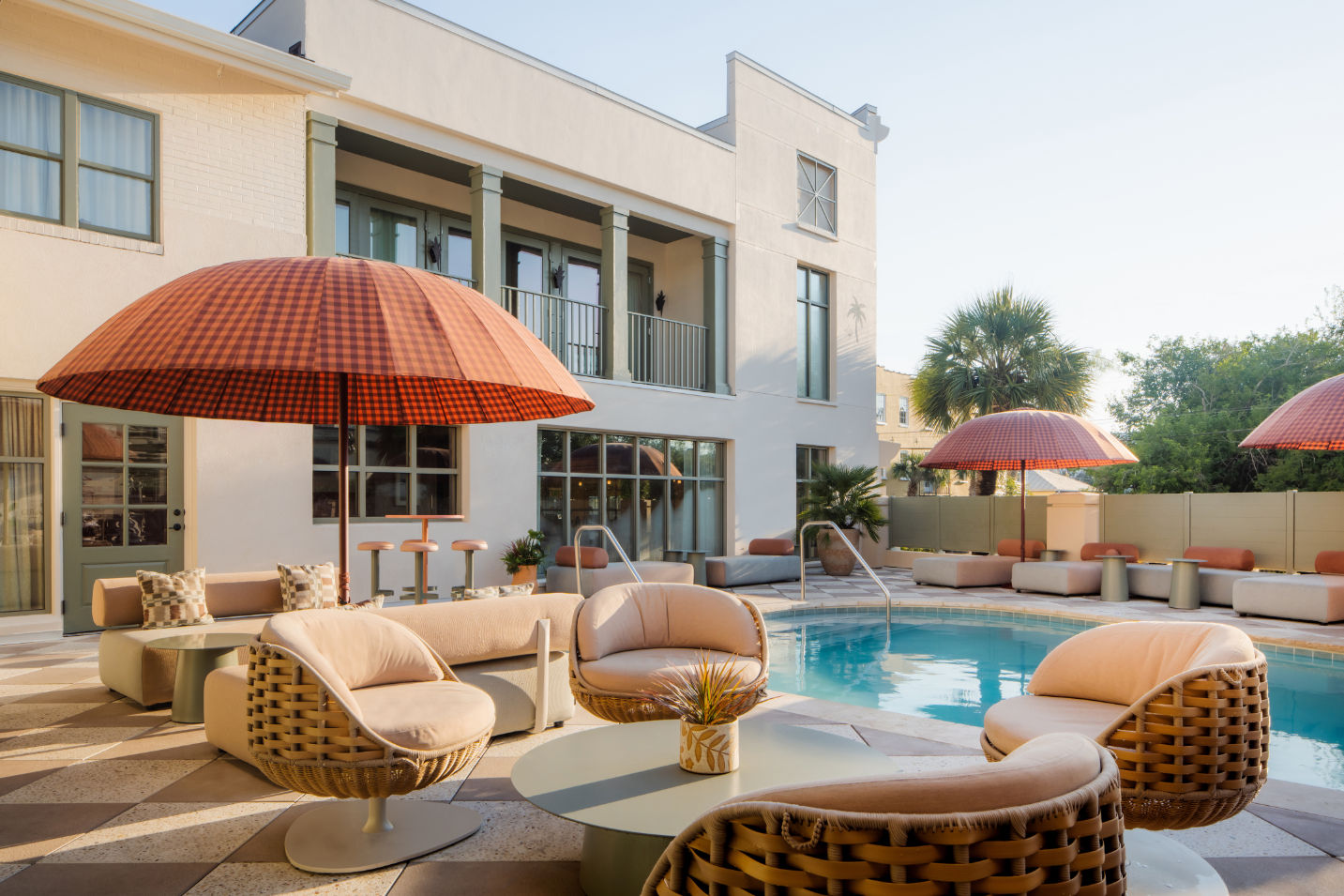 image Cozy up in stylish outdoor lounges, perfect for golden-hour conversations and cocktails.