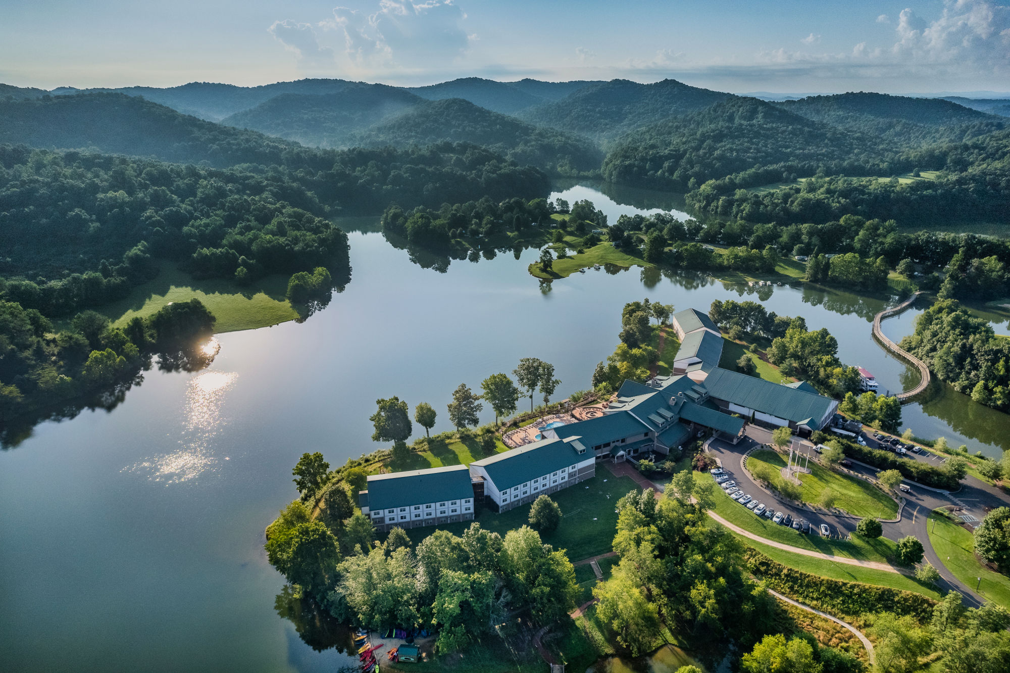 image A peaceful aerial view reveals the resort’s perfect harmony with its lush, mountainous surroundings.