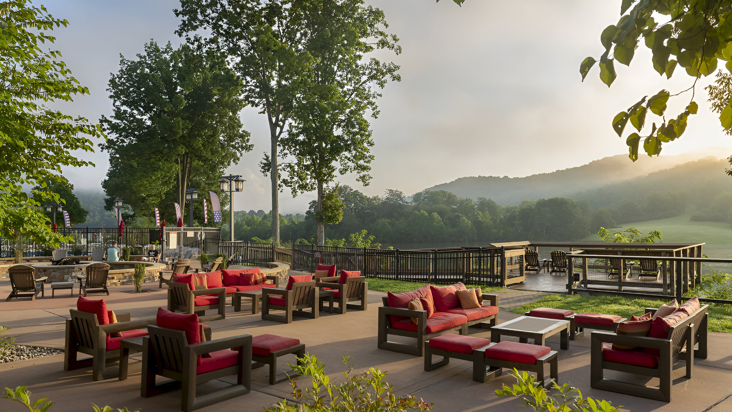 image Open-air seating and sweeping lake views create an inviting atmosphere for relaxed conversations and sunset watching.