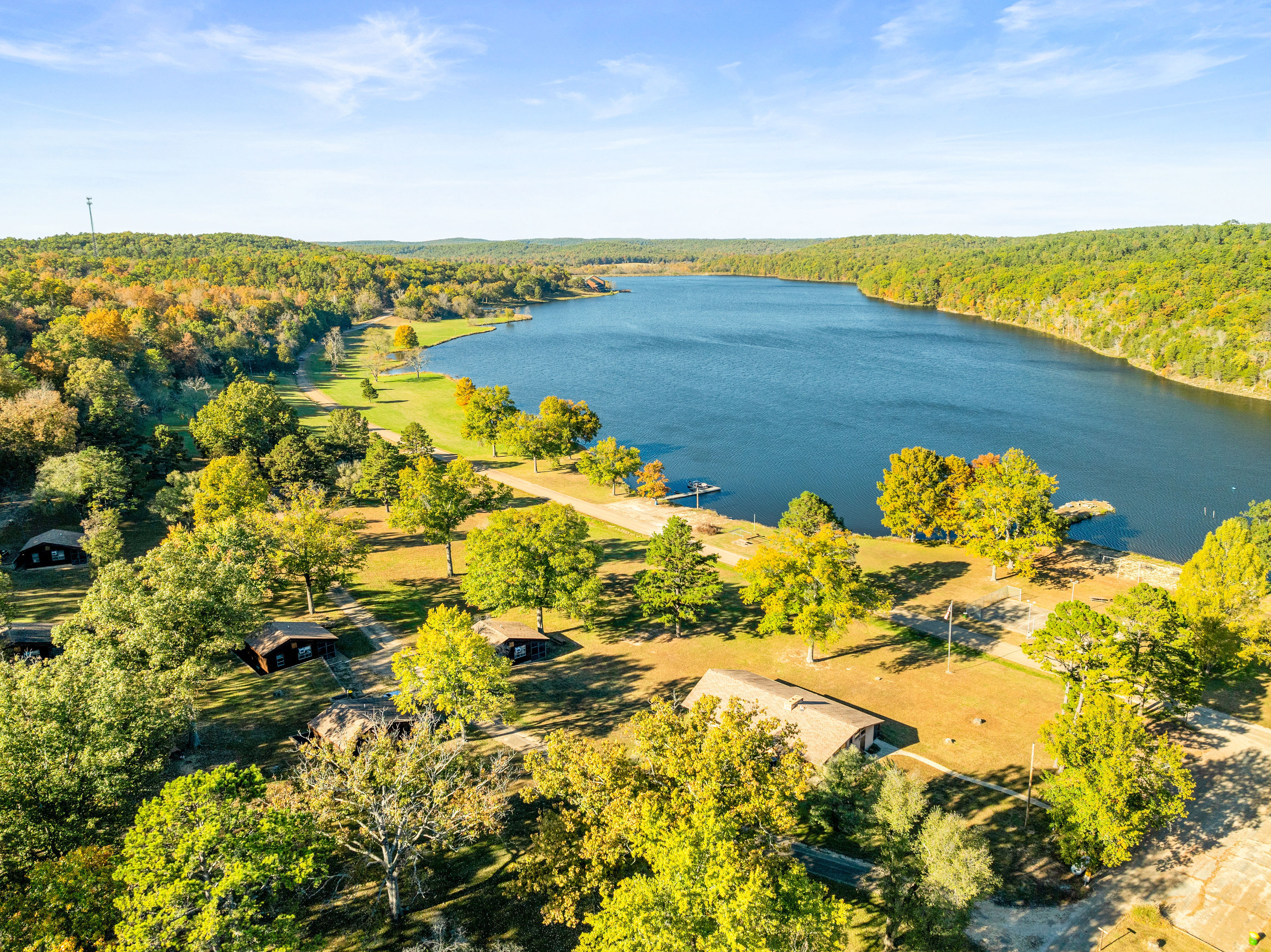 image Stunning aerial view of Sunnen Lake, offering endless opportunities for fishing, kayaking, and relaxation.