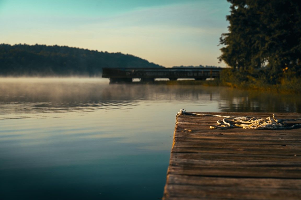 image Crisp fall mornings on Sunnen Lake. Watch the mist rise over the water before a day of kayaking, canoeing, or just soaking in the autumn colors.