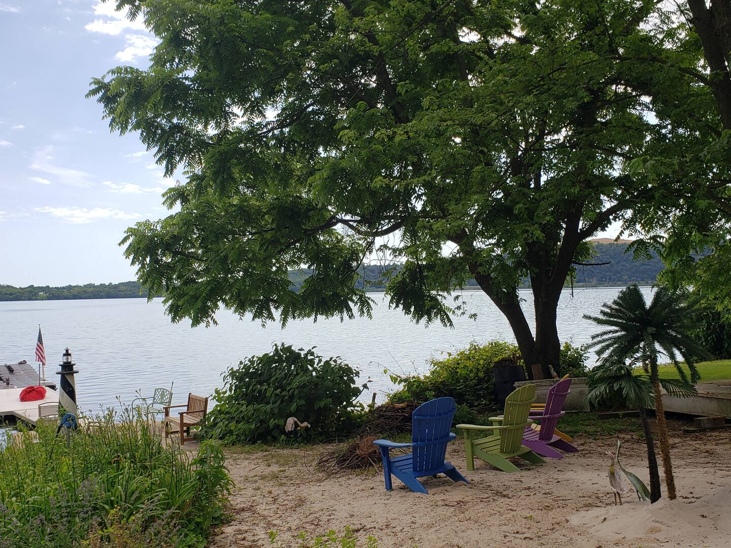image Relax on the beach, take in the view, or swim, wade, and fish from the dock.