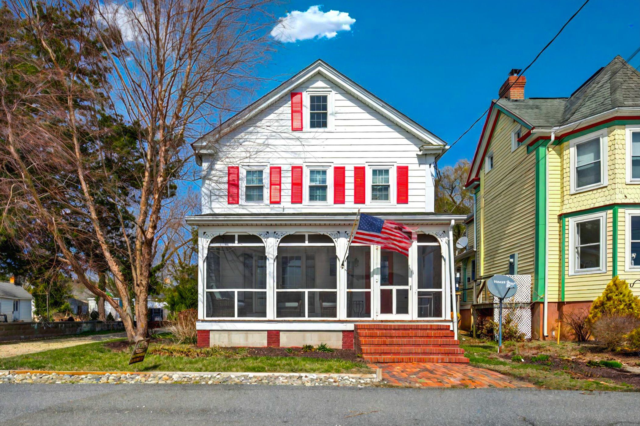 image Charming riverfront home with a welcoming front porch—perfect for morning coffee or evening chats.