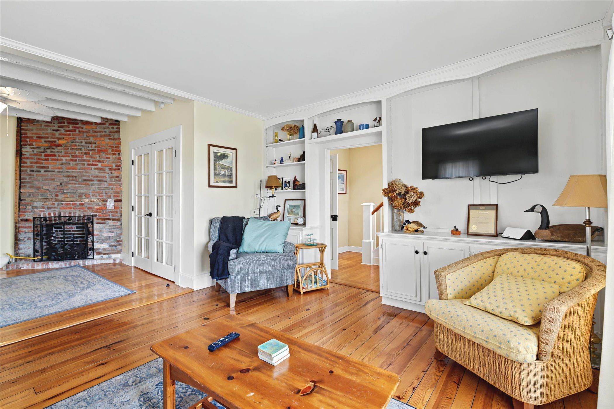 image Secondary living area with Smart TV and fireplace—perfect for relaxing after a day on the river.