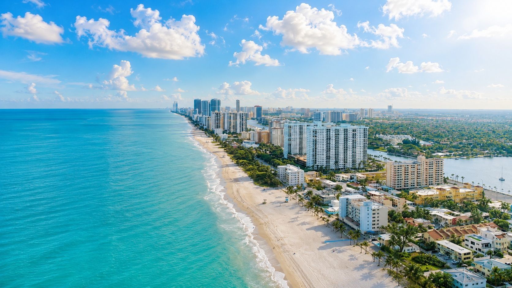 image Coastal view with tall buildings and calm turquoise water