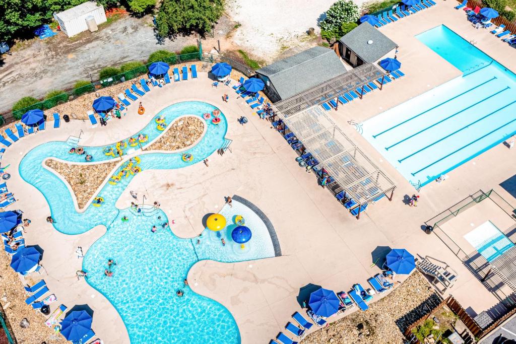 image Family-friendly pool area with lounge chairs