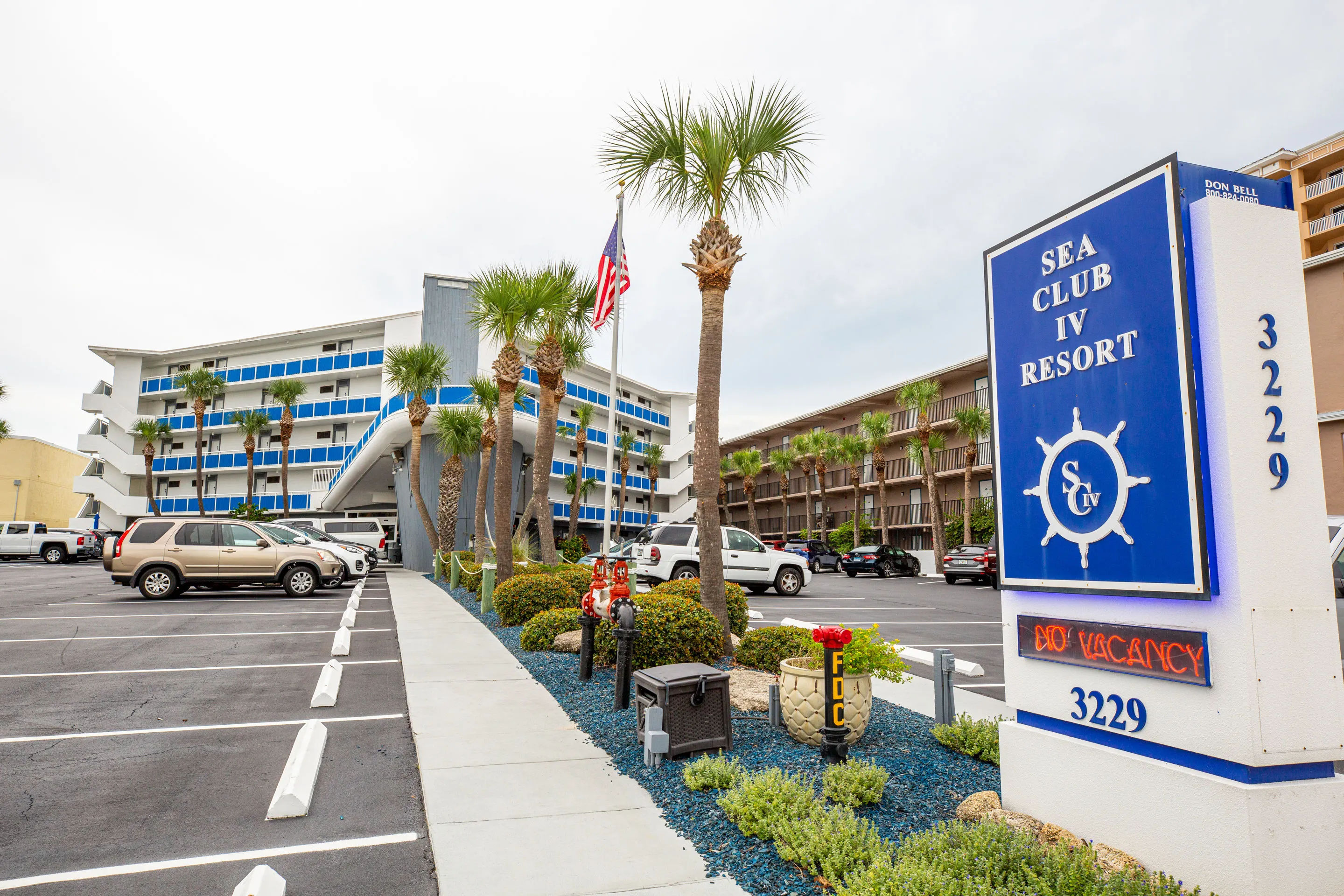 image The vibrant exterior of Sea Club IV Resort welcomes guests with colorful balconies and a tropical atmosphere.
