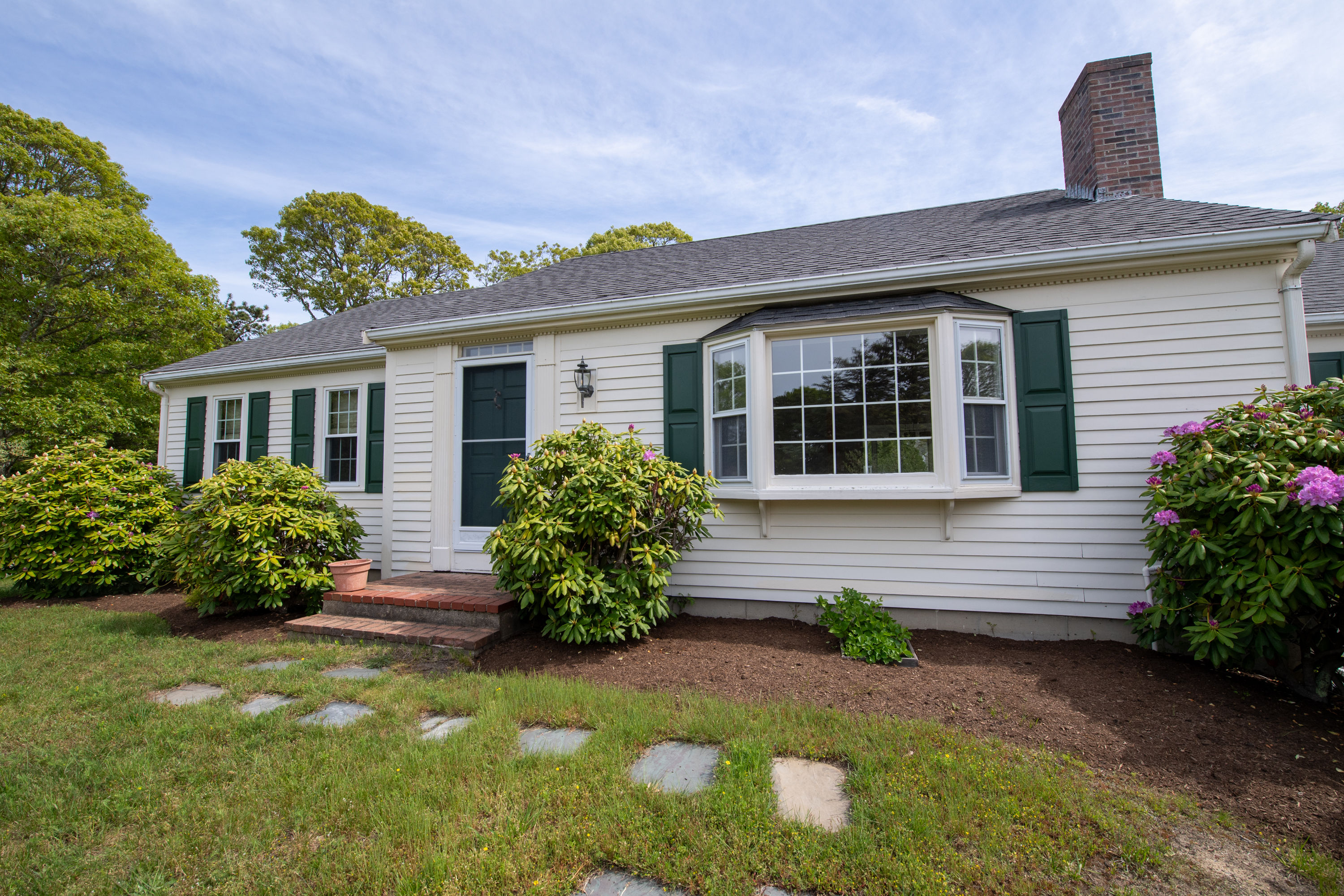 image Welcome to your Cape Cod escape—this classic New England home offers timeless charm and cozy comfort for your stay.