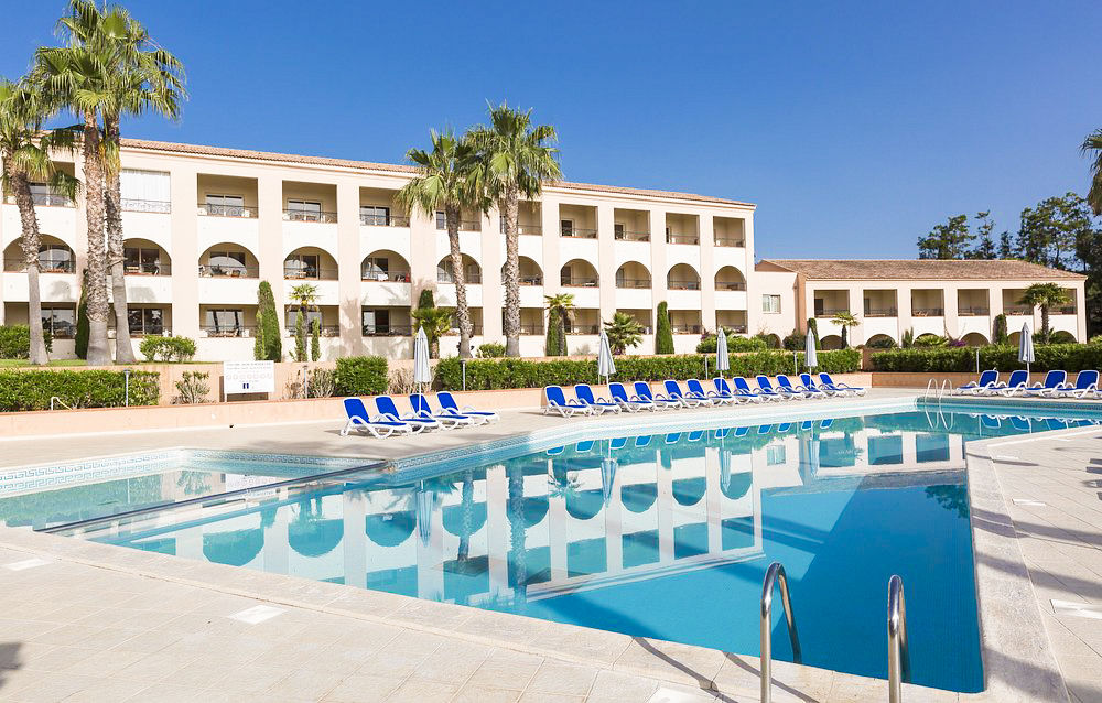 image Cool off in one of the two outdoor pools at Sognu di Mare, just minutes from the Marine de Bravone beach.