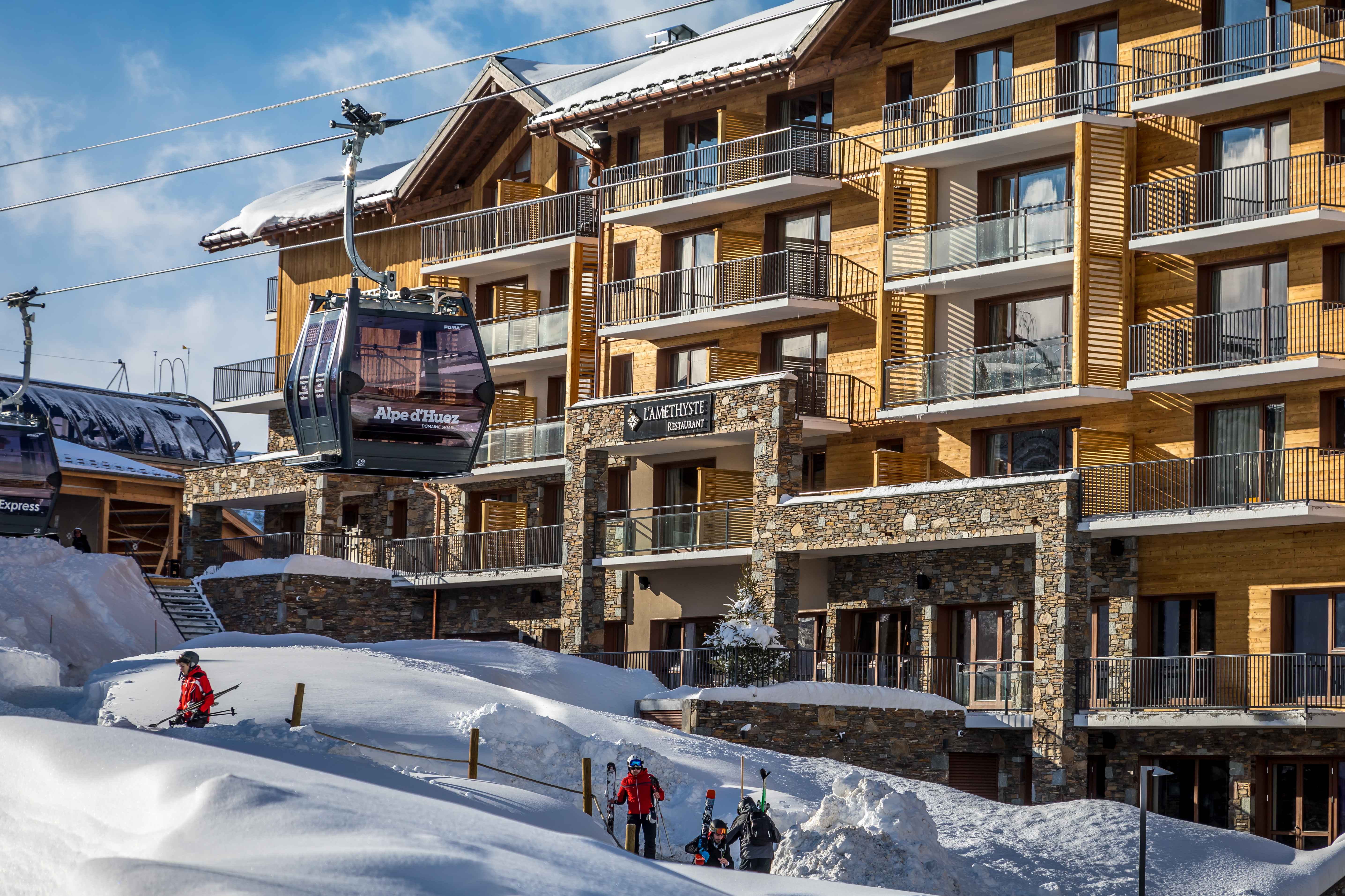 image Après-ski ambiance awaits as the sun sets over the snowy terraces of Daria-I Nor.