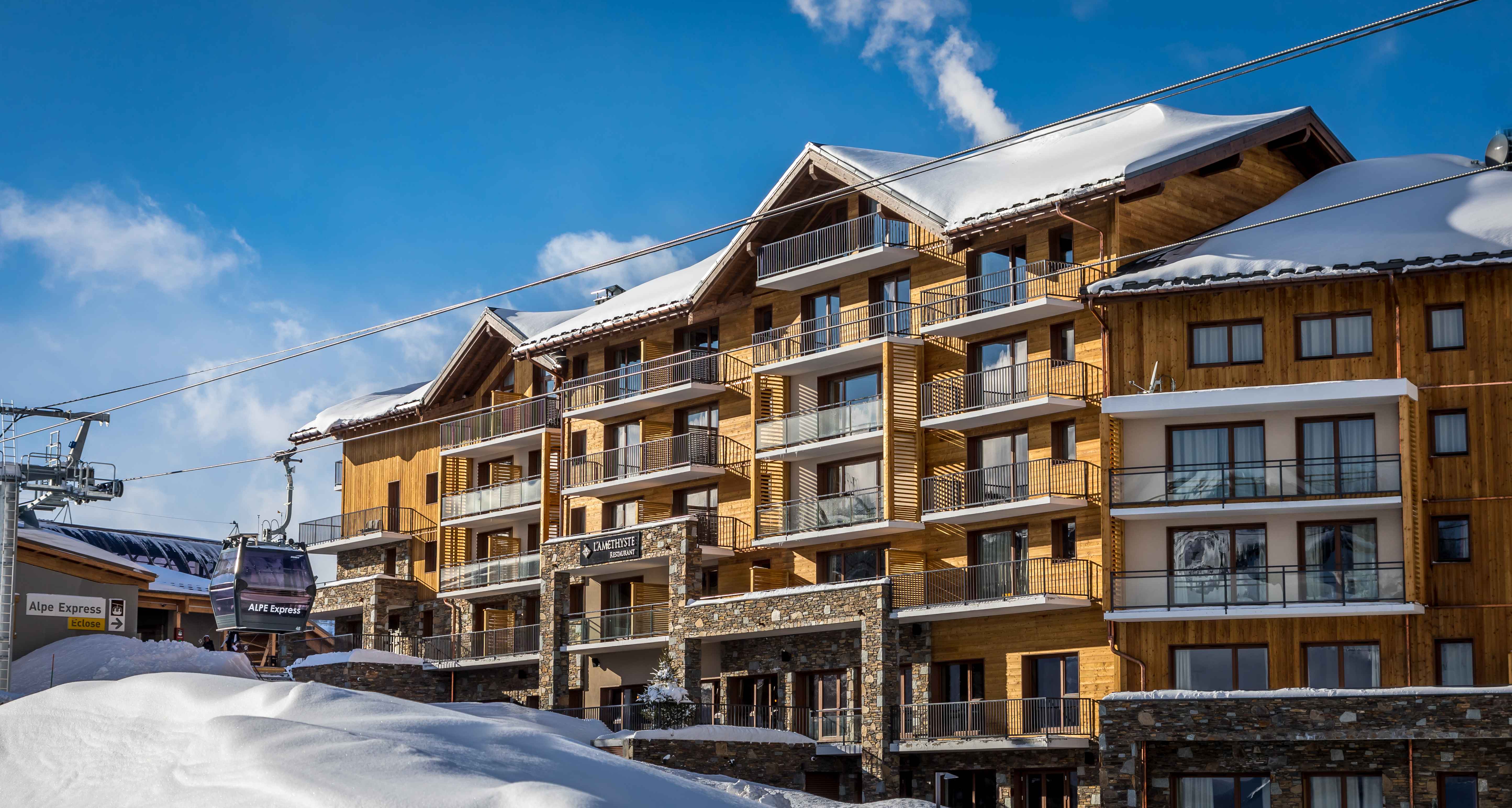 image Ski-in, ski-out elegance with panoramic balconies that capture every glint of alpine sunshine.