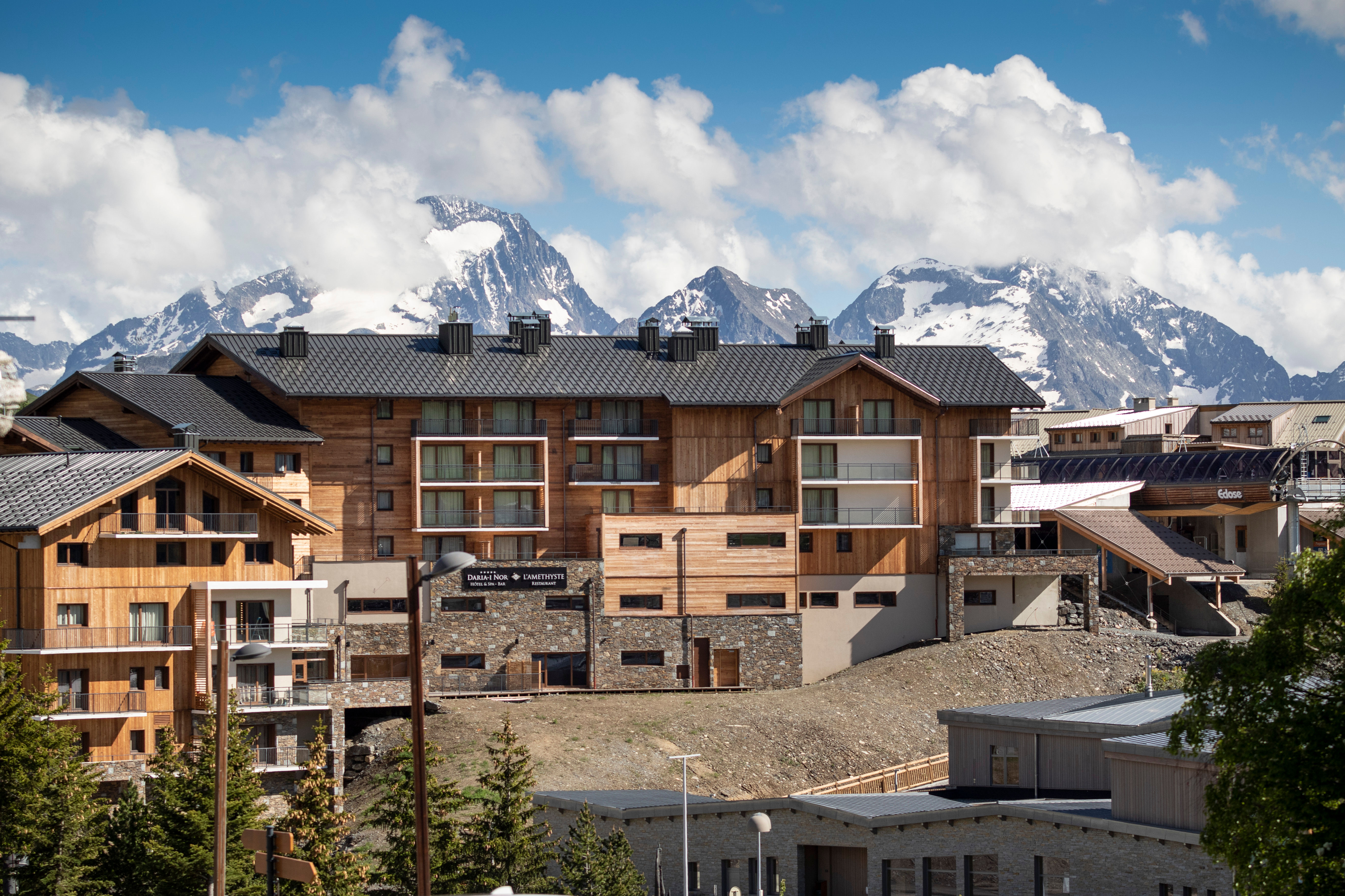 image Wake up to breathtaking alpine views—Daria-I Nor nestles in the heart of the peaks, glowing under summer skies.