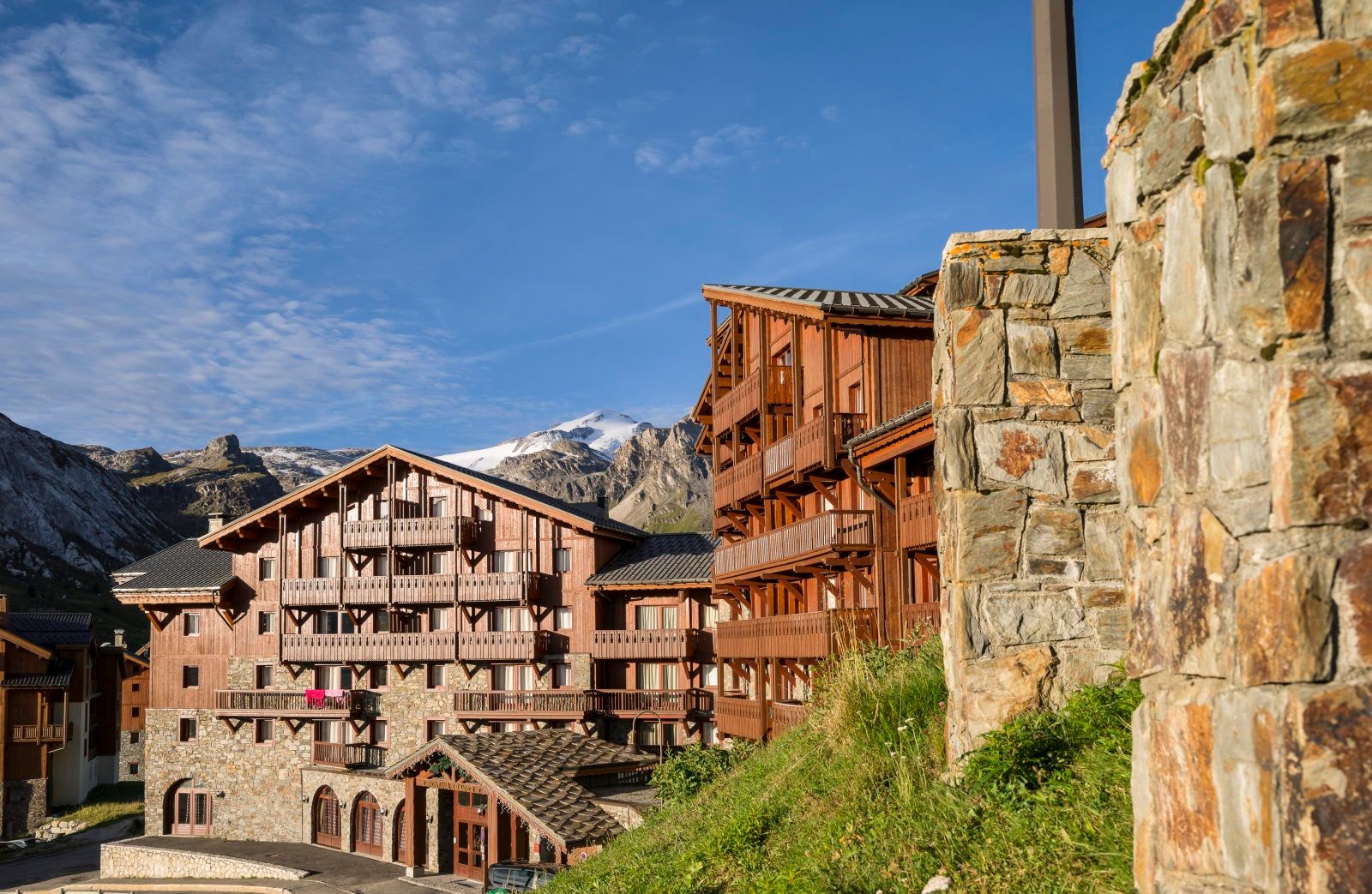 image Traditional alpine architecture set against breathtaking mountain views in the heart of Tignes