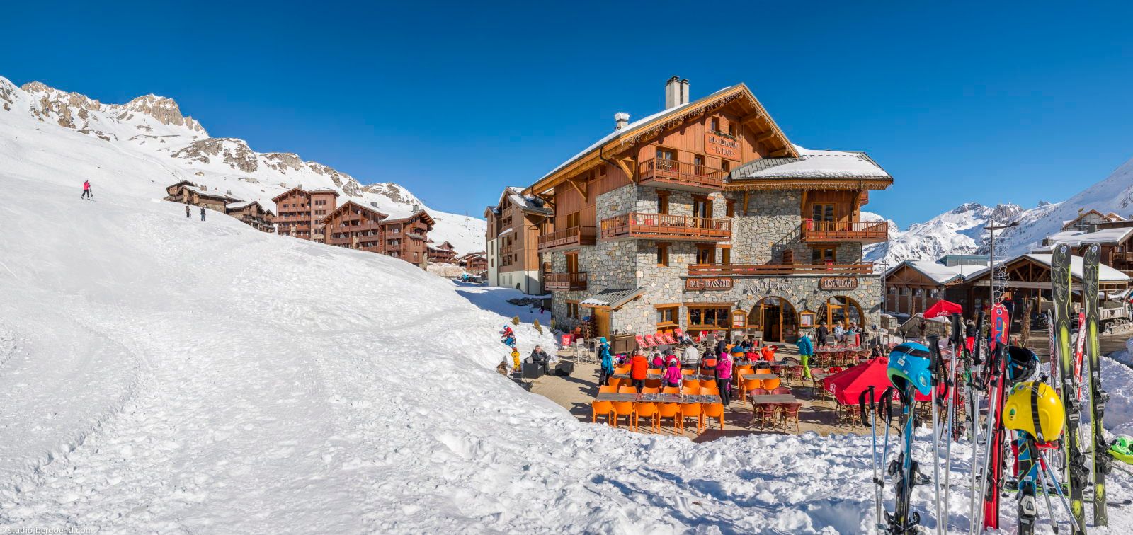 image Little skiers take their first turns — a snow-covered restaurant perfect for families with children