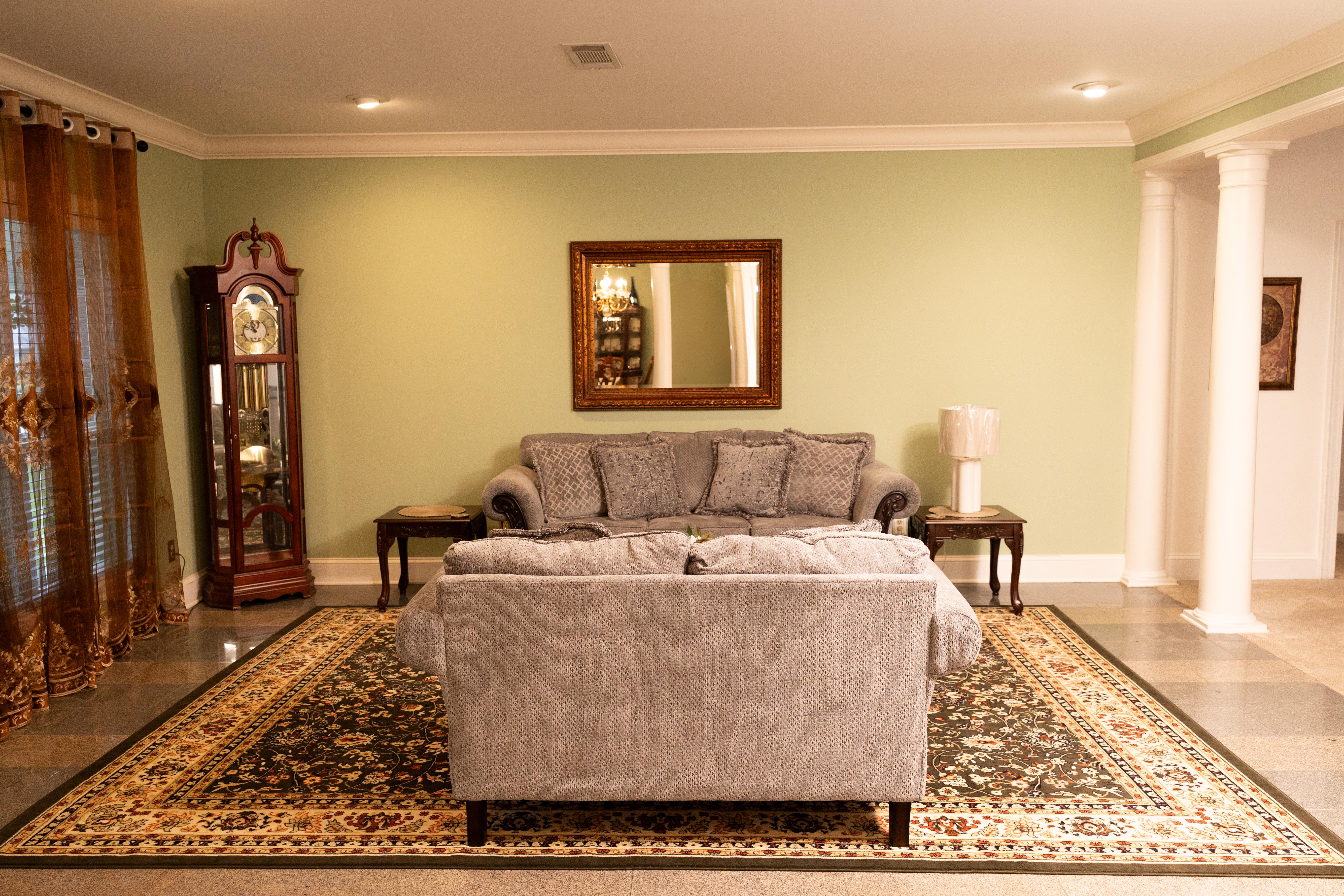 image Step into cozy elegance with this inviting living room featuring plush furnishings and tasteful decor.