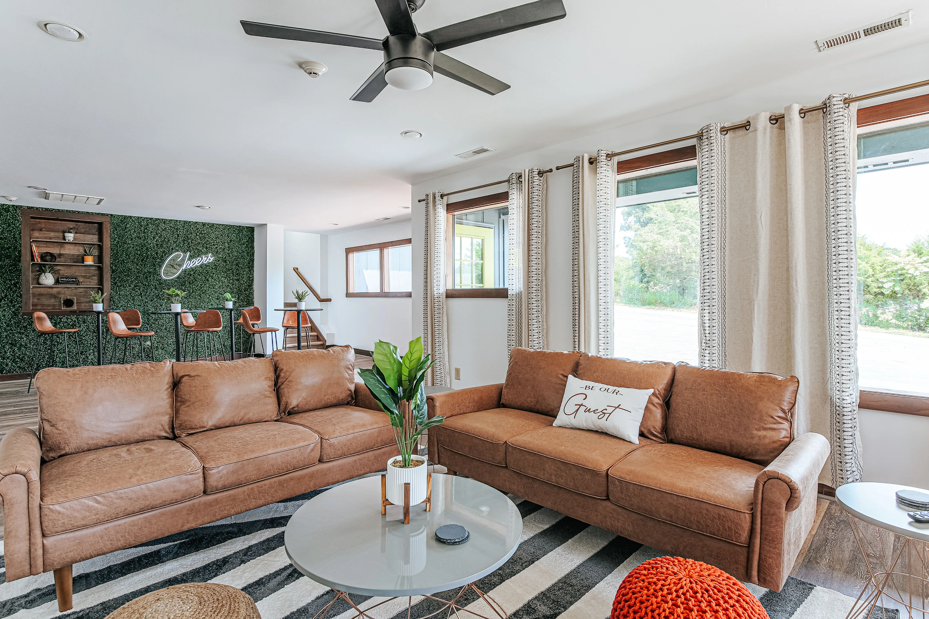 image Experience warmth and camaraderie in this stylish common space, ideal for unwinding with friends.