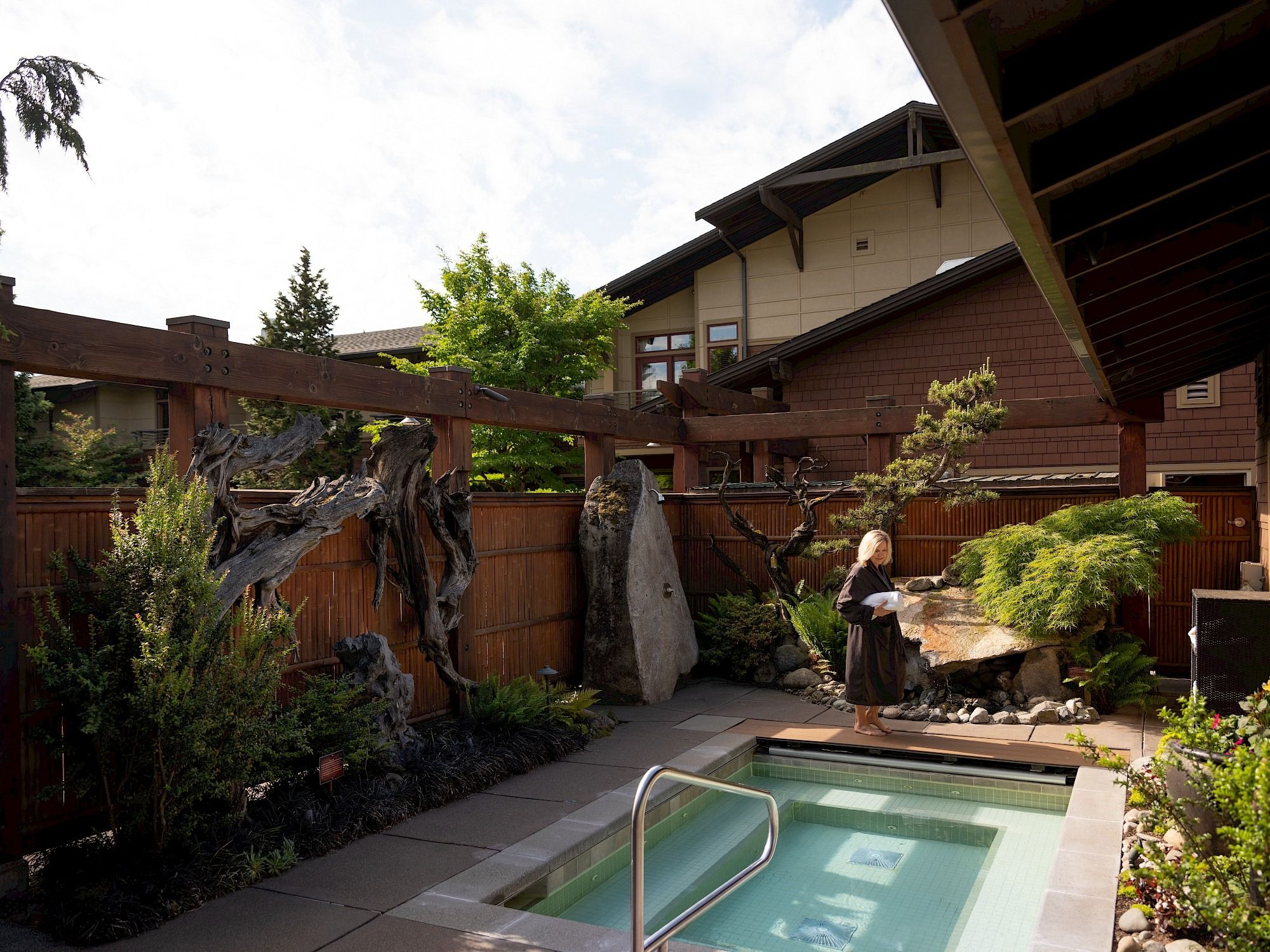 image Tucked within a private courtyard, warm waters invite you to unwind beneath open skies.