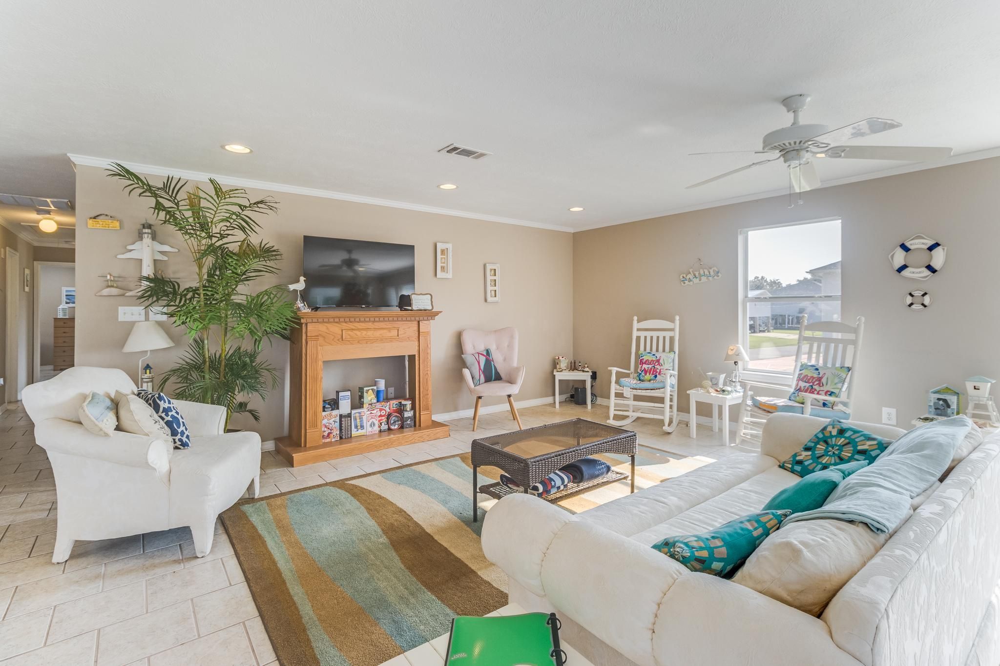 image The cozy living room showcases comfortable seating and a charming fireplace, perfect for family gatherings.