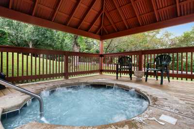 Unwind in the steamy comfort of the covered hot tub — perfect after a Dollywood day or mountain hike.