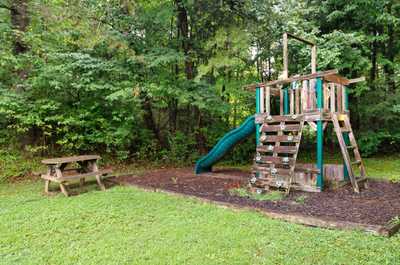Let the kids burn off energy at the outdoor playground — a shaded space for big fun and little adventures.