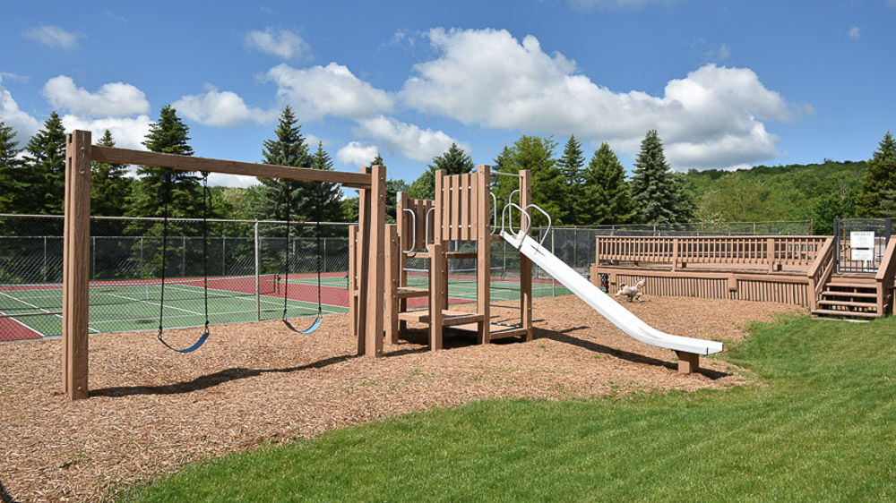 image Inviting playground space that brings laughter and energy to the heart of the mountain community.