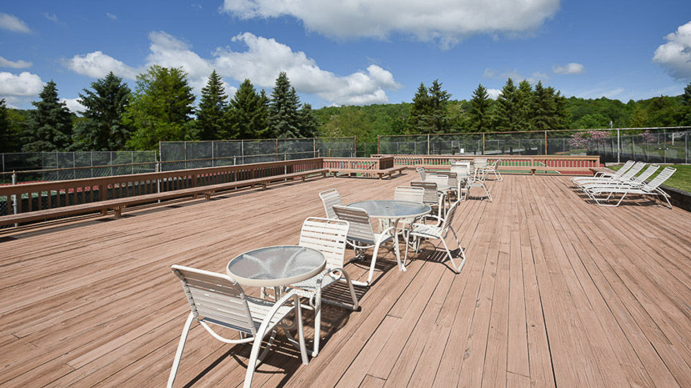 image Spacious sun deck surrounded by forest views, perfect for soaking in fresh mountain air and unhurried afternoons.