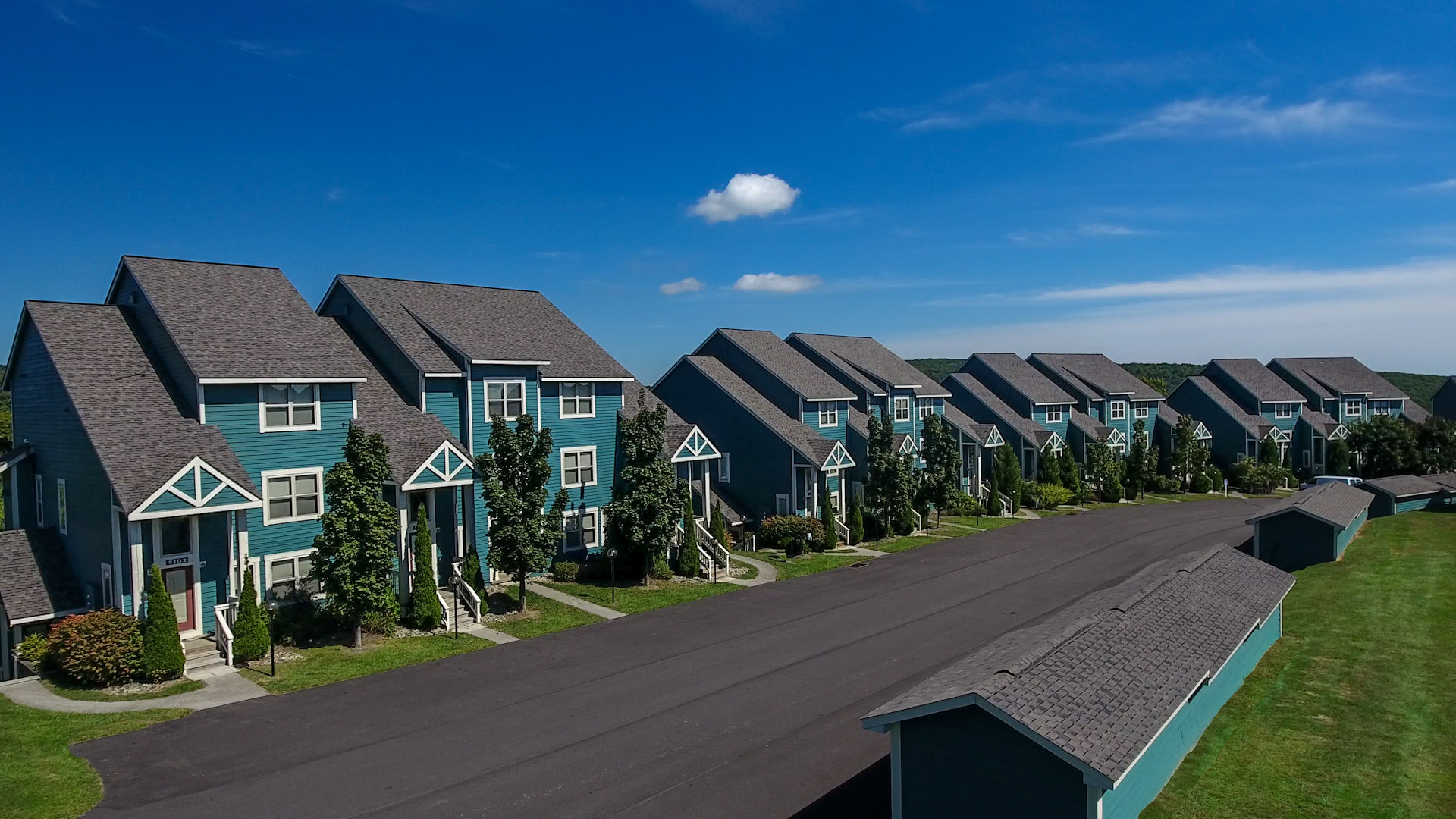 image Peaceful row of mountain homes nestled in the Laurel Highlands, offering the perfect blend of comfort and scenic tranquility.