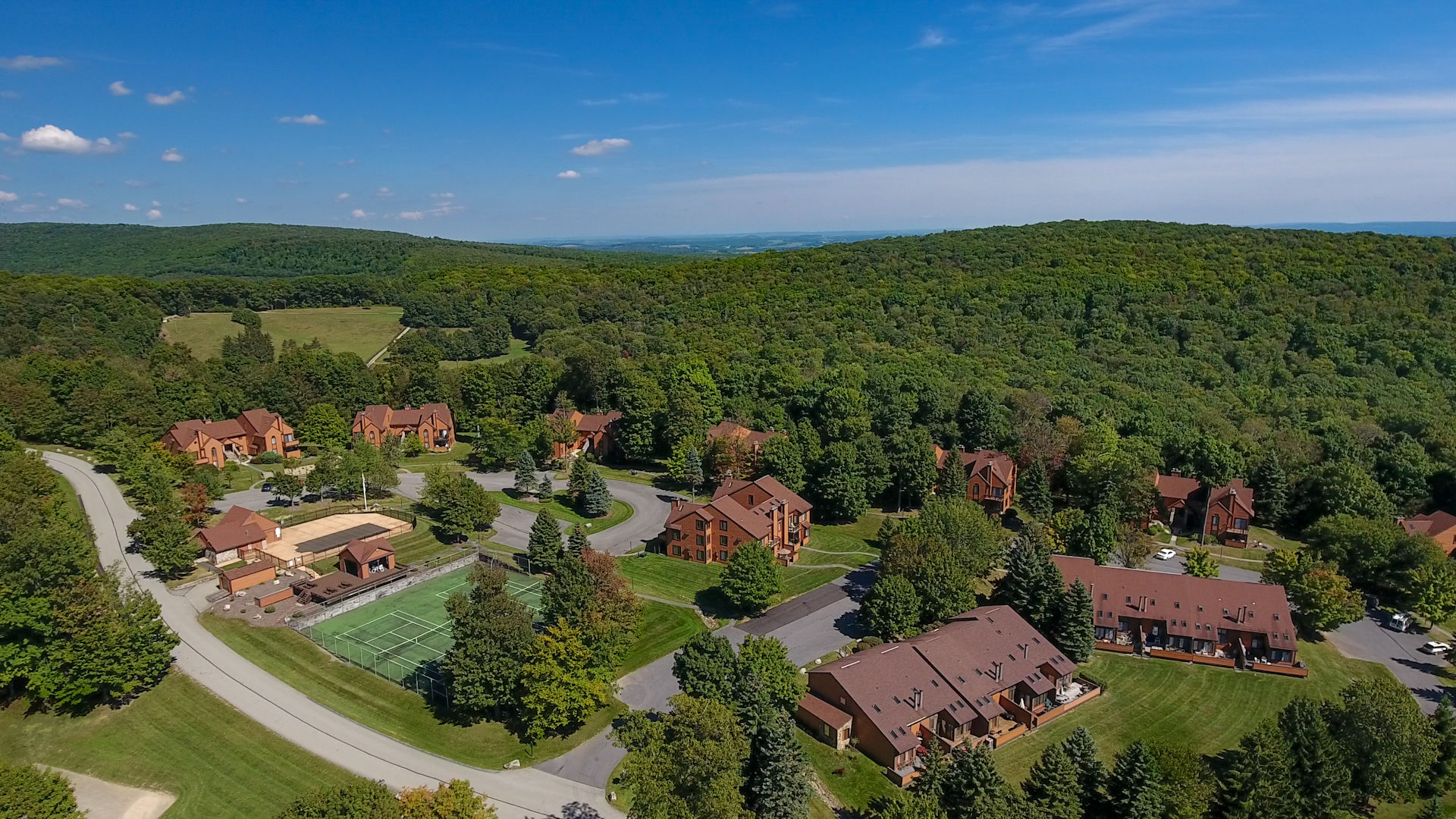 image Aerial view of Swiss Mountain tucked into the forested slopes of the Laurel Highlands.