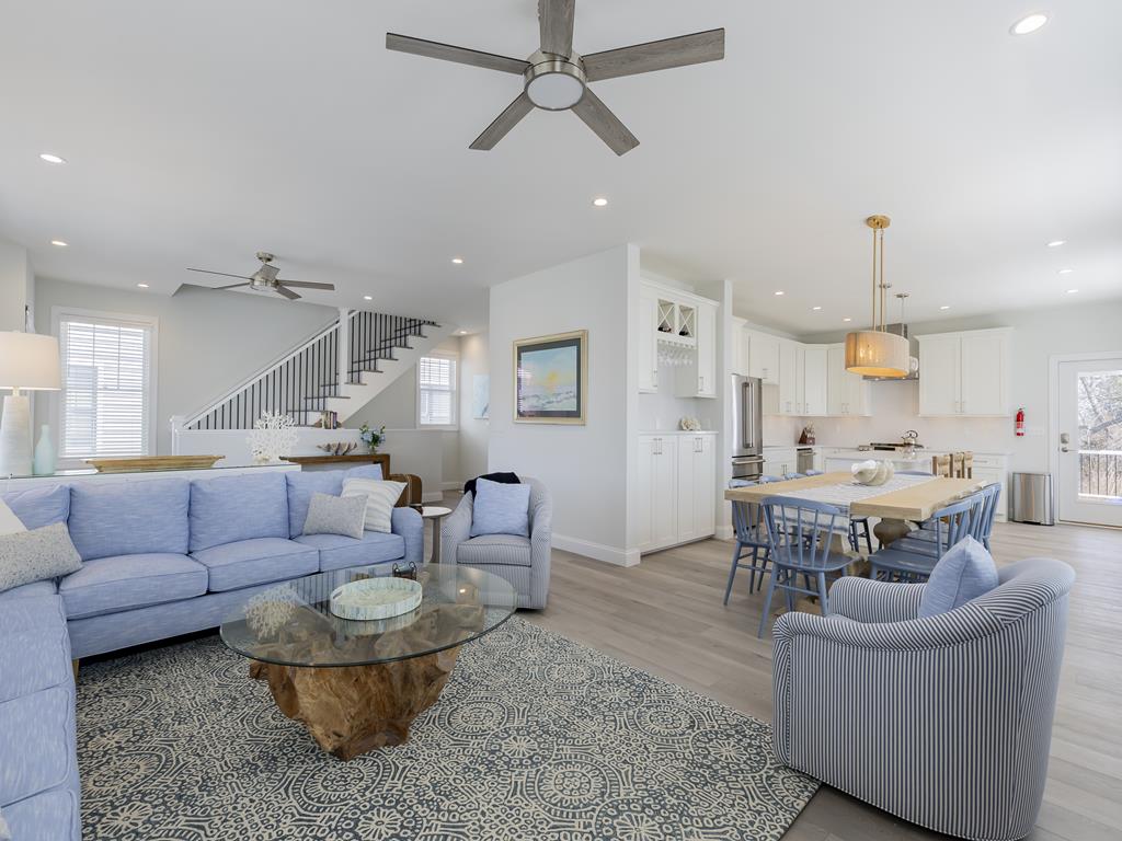 image Ample space for entertaining with a luxurious great room that flows effortlessly from lounging to dining.