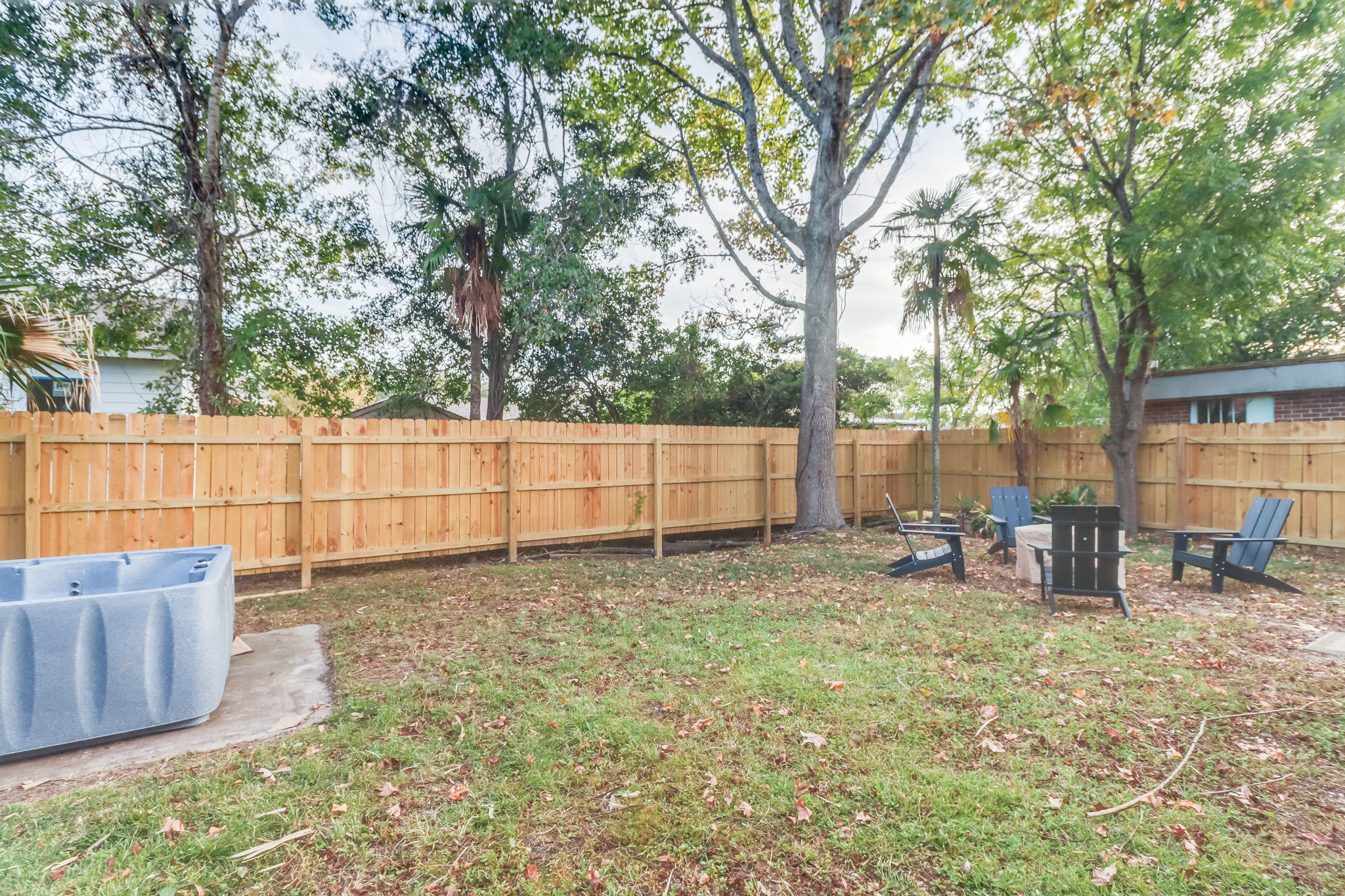 image Enjoy the private backyard, perfect for evening gatherings under the stars.