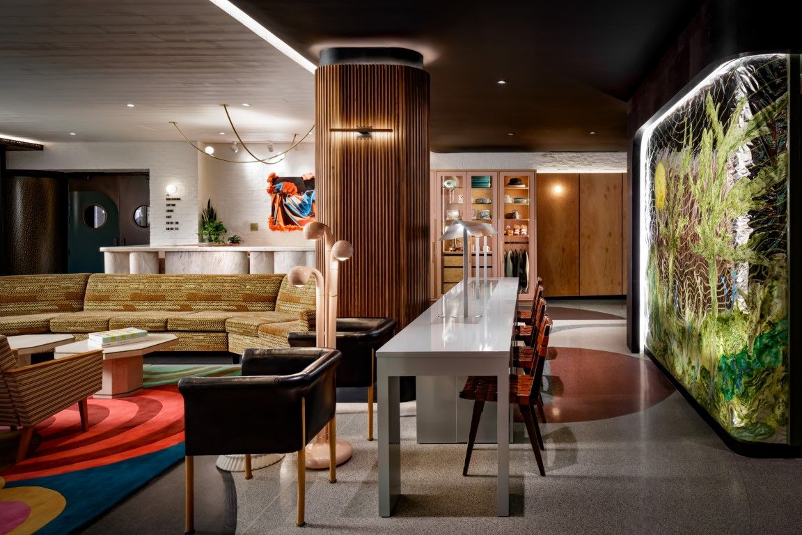 image The Drake Hotel's lobby showcases an inviting boutique hotel style with vibrant art and modern furnishings that embody the energy of Queen West.