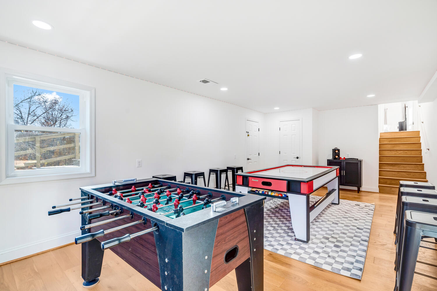 image Foosball, laughter, and friendly rivalries fill this lively corner built for carefree nights in the countryside.