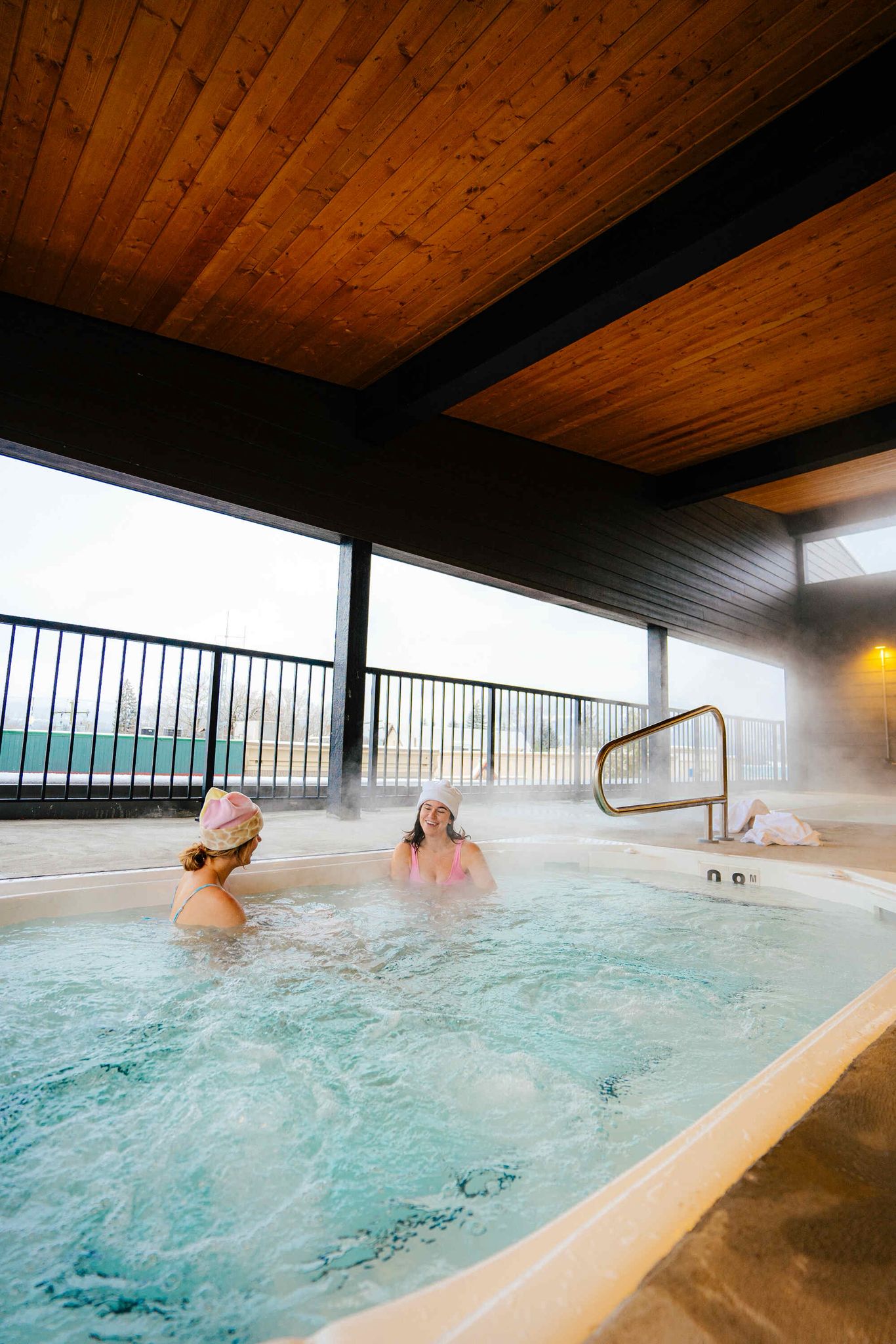 image Relax in our covered outdoor hot tub, perfect after a day of adventure.