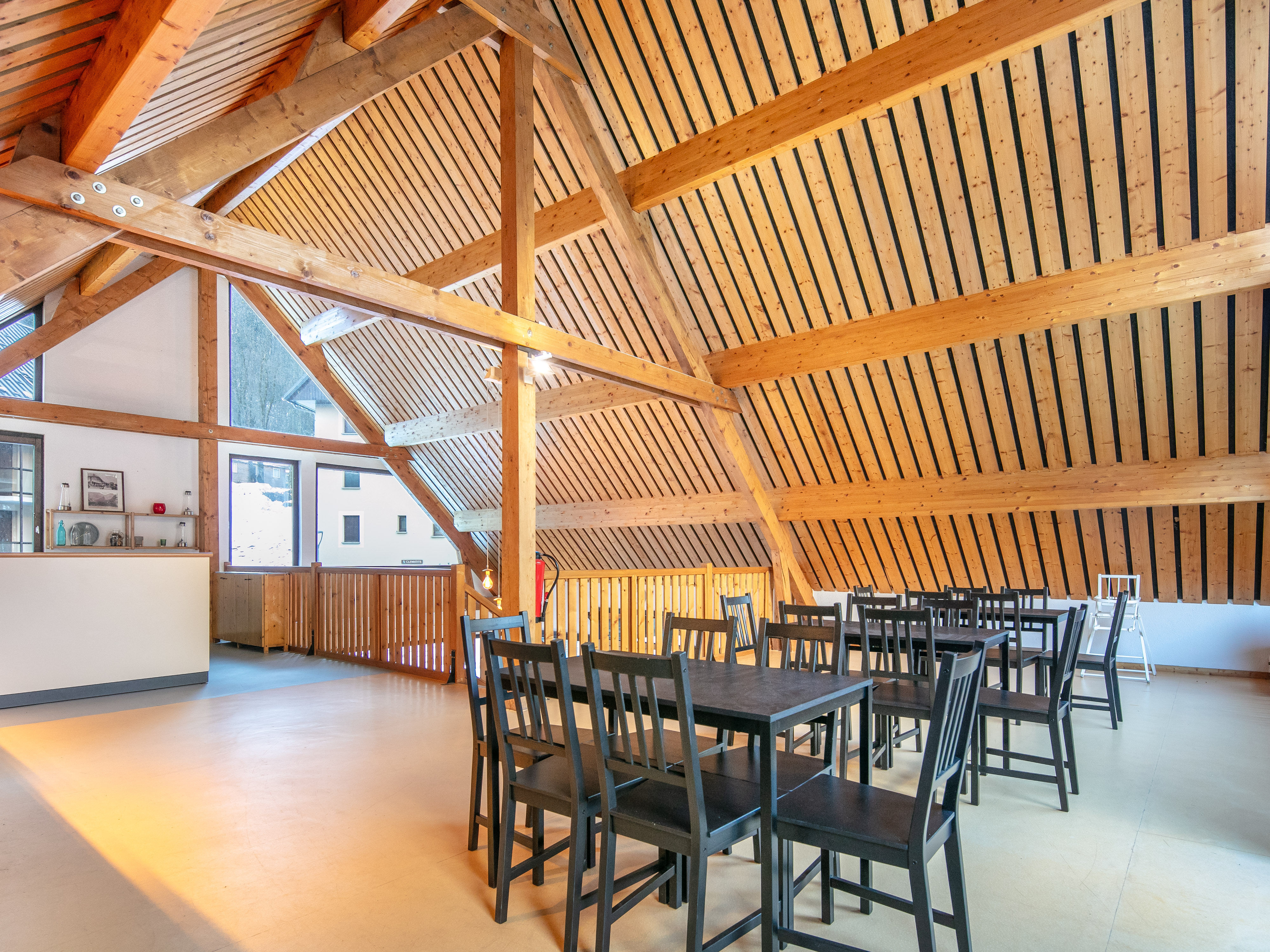 image Enjoy a warm sense of community in this inviting space, where authentic Savoyard decor meets stunning mountain vistas, perfect for relaxing after a day of adventure.