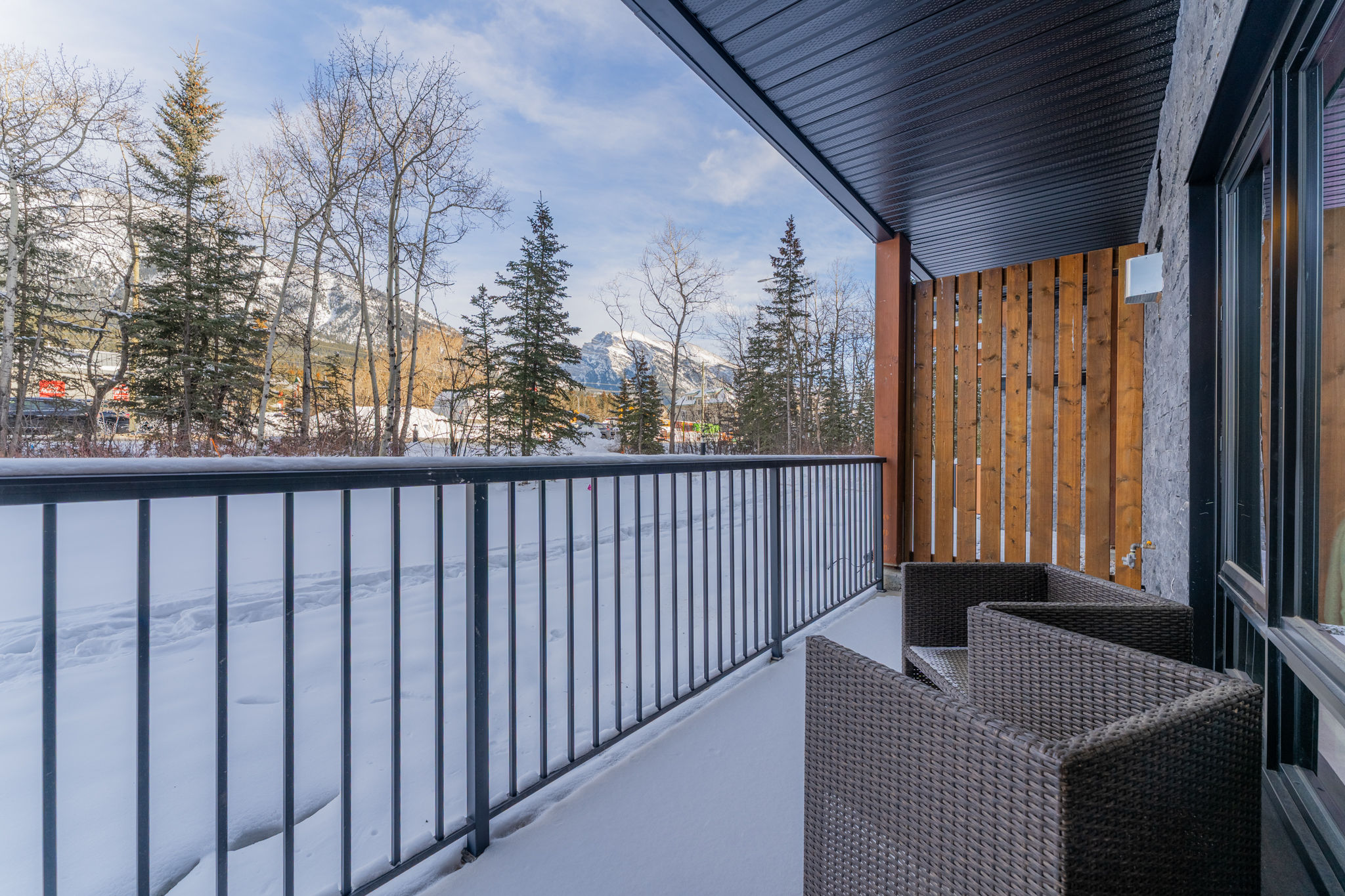 image Step onto the balcony and enjoy snowy mountain scenery.