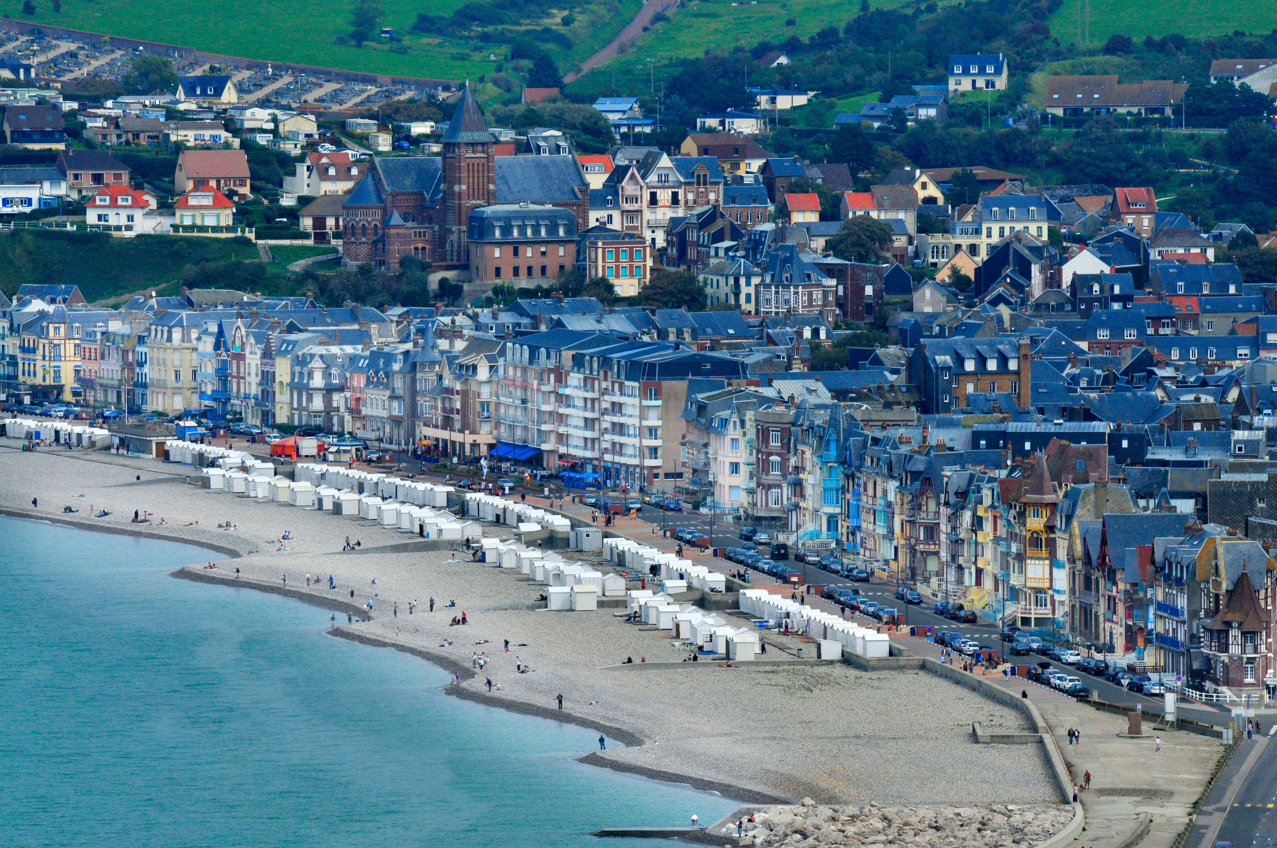 image Feel the ocean breeze as you walk along the expansive beach, just steps from your doorstep