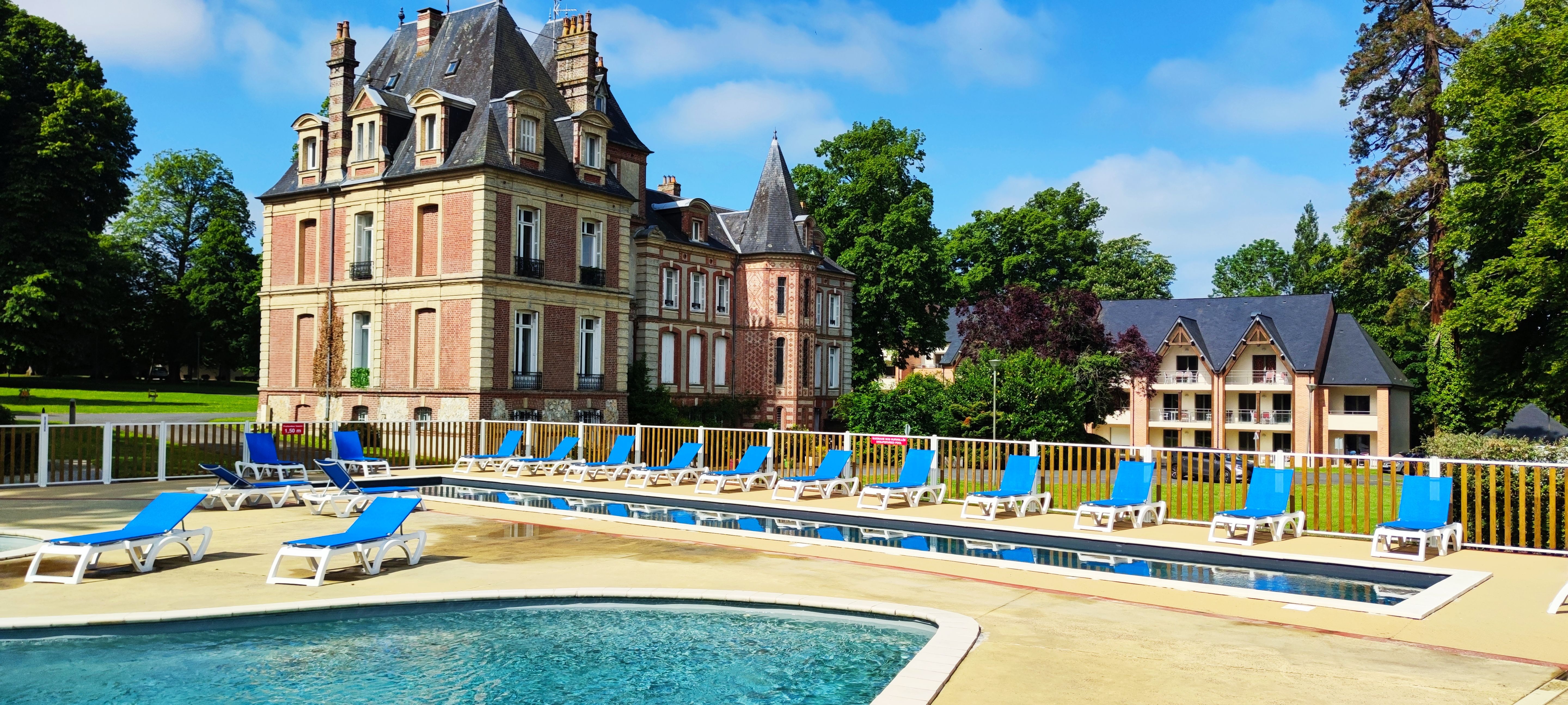 image Heated outdoor pool with a children's section and lap lane, open from April through mid-September