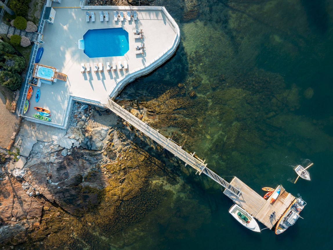 image Set above the shoreline, this peaceful retreat blends salty breezes, open skies, and endless water views.