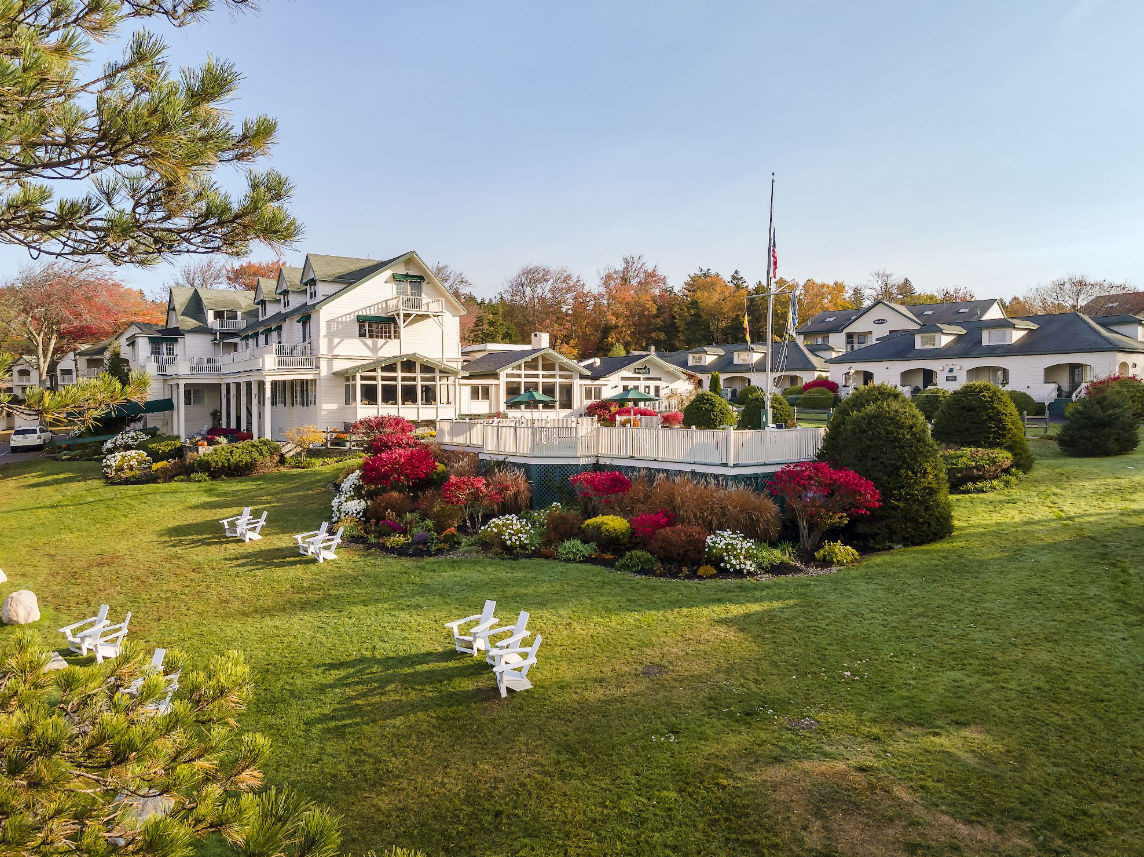 image Linger on lush green lawns surrounded by vibrant blooms and the gentle rhythm of slow afternoons.