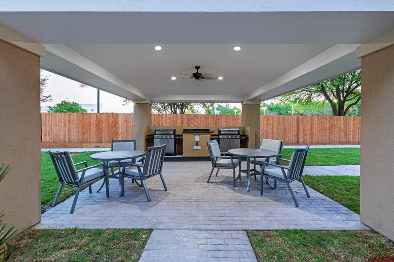 image Gather around the outdoor grill area, perfect for cookouts with friends.