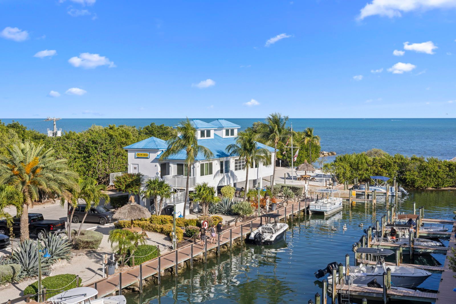 image Stroll along the boardwalk, surrounded by lush greenery and coastal charm.