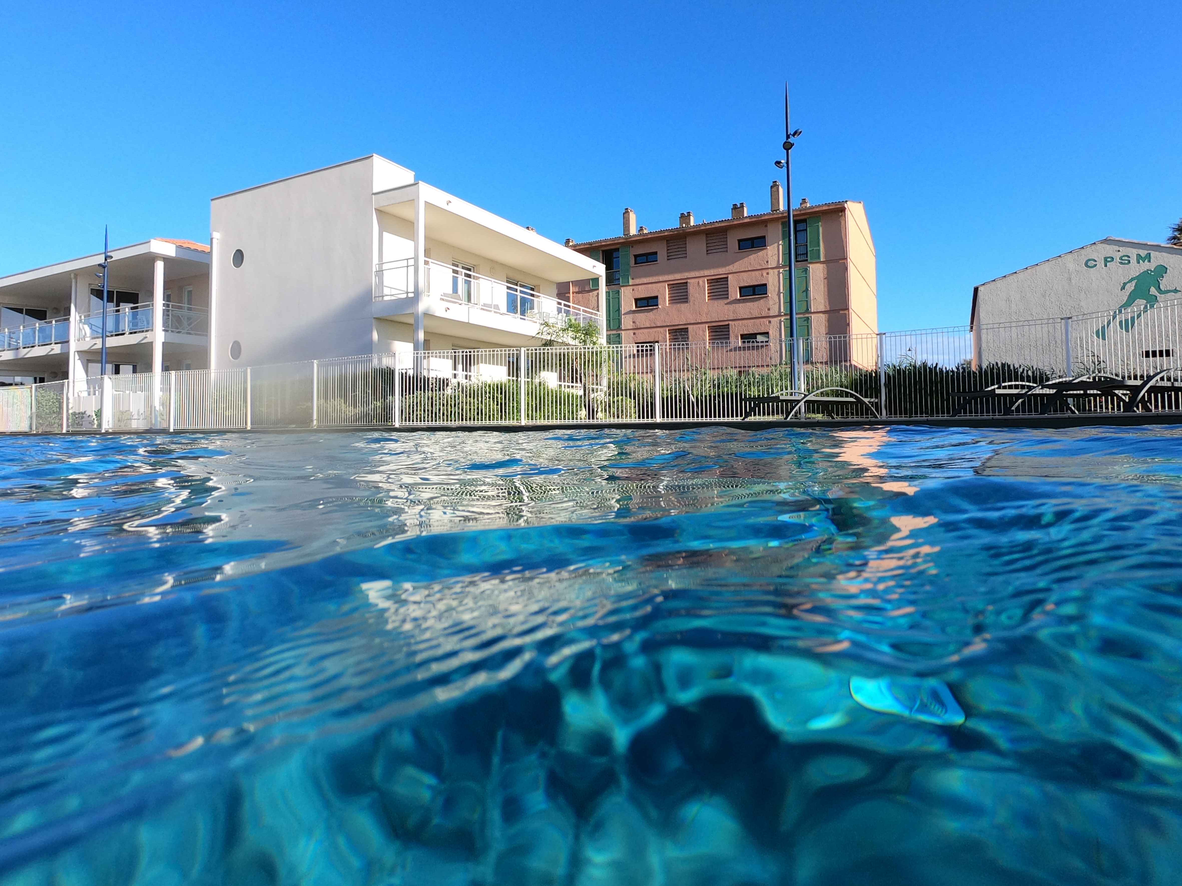 image Crystal-clear waters of the heated outdoor pool, refreshing and inviting from the first warm days of spring through to autumn.