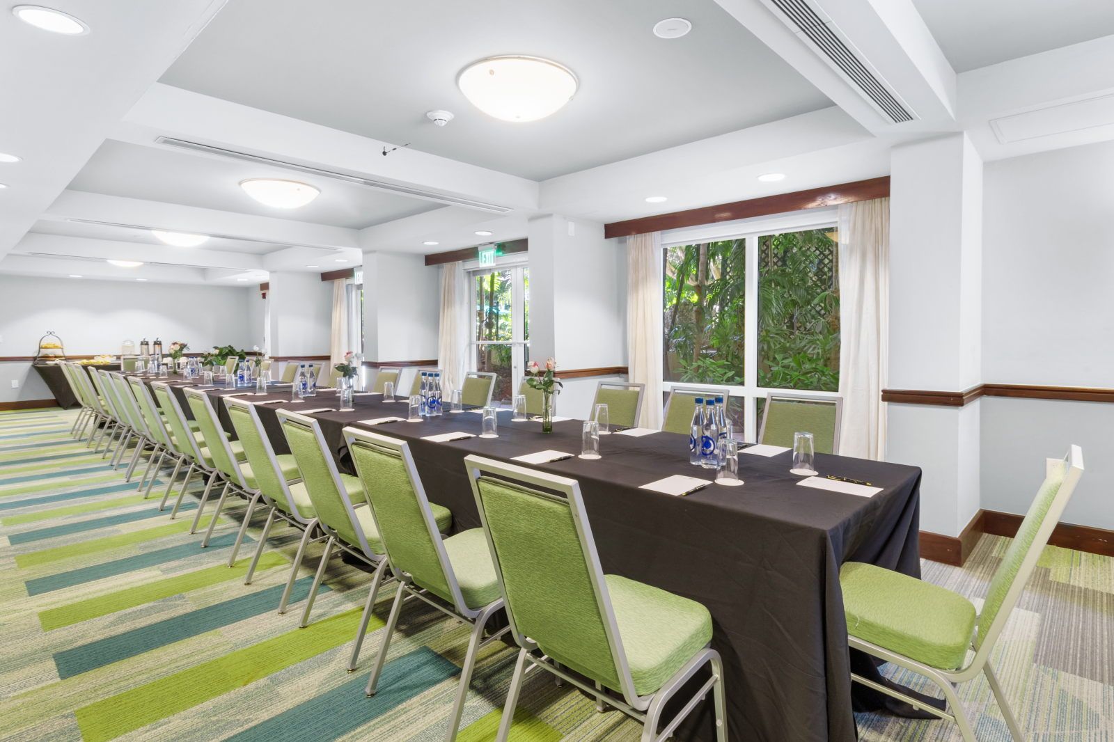 image Gather around this stylish conference room for productive meetings and events.