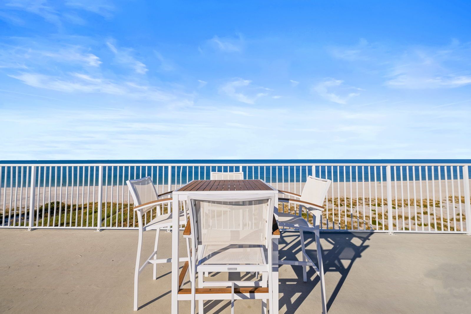 image Breathe in the fresh ocean air while lounging at this sun-drenched terrace with stunning bay views.