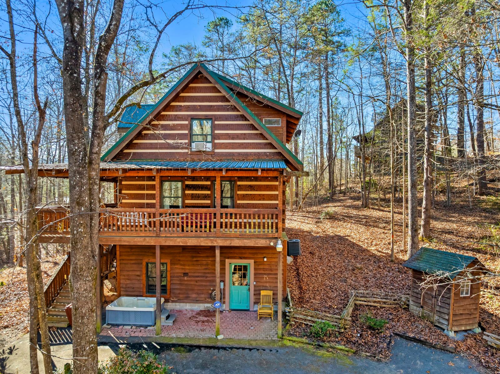 image Immerse yourself in nature with a quaint cabin retreat surrounded by forest and warm rustic details.