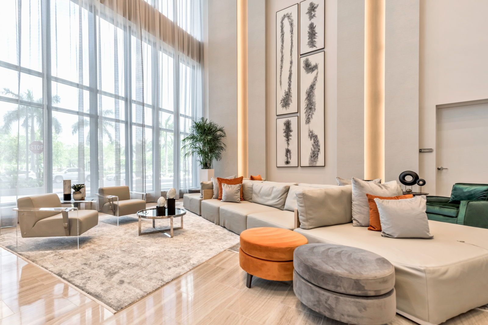 image Relax in the elegant lounge area, surrounded by natural light and chic decor.