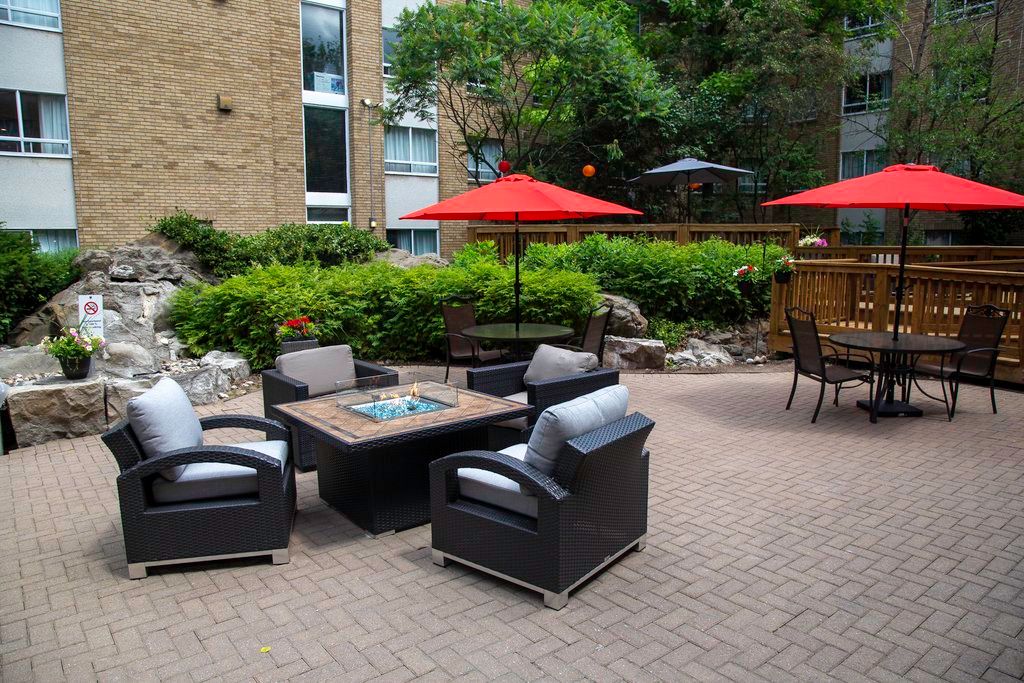 image Evening fire pit in the courtyard — the social hour atmosphere carries outdoors on warm nights.